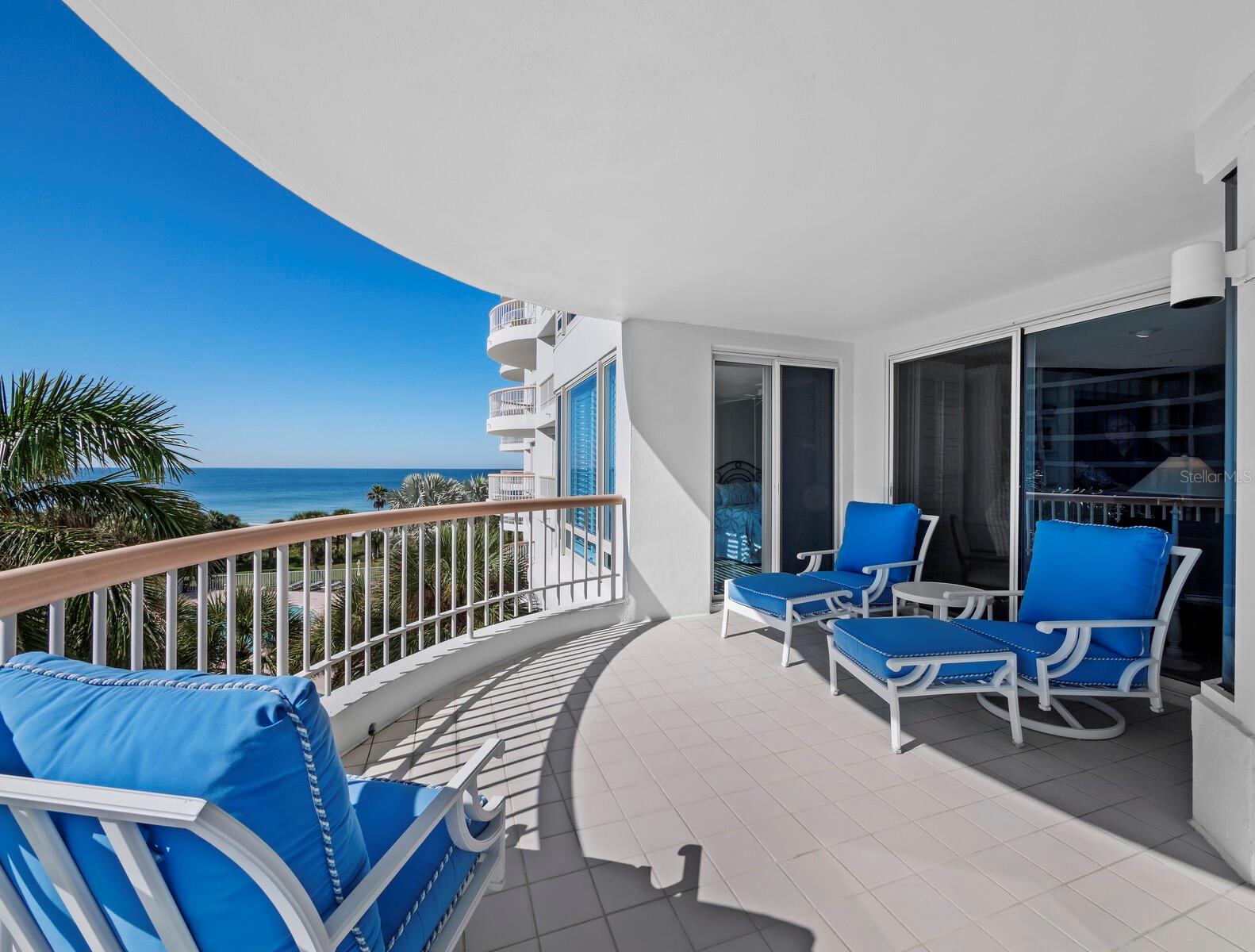 Enjoy the sights and sounds of beachfront living. Primary suite has direct access to this terrace, and amazing views. - 455 LONGBOAT CLUB RD #402, LONGBOAT KEY