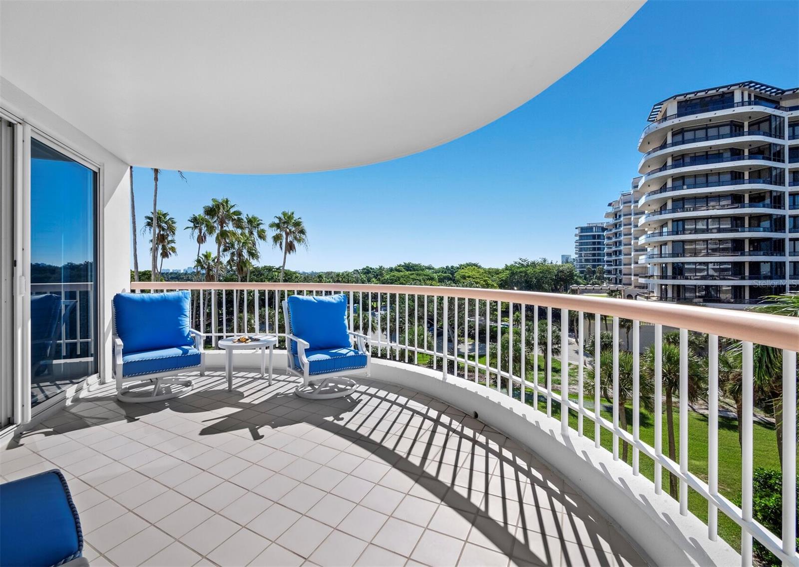 The view to the east overlooks the golf course, bay and to the city of Sarasota beyond. - 455 LONGBOAT CLUB RD #402, LONGBOAT KEY