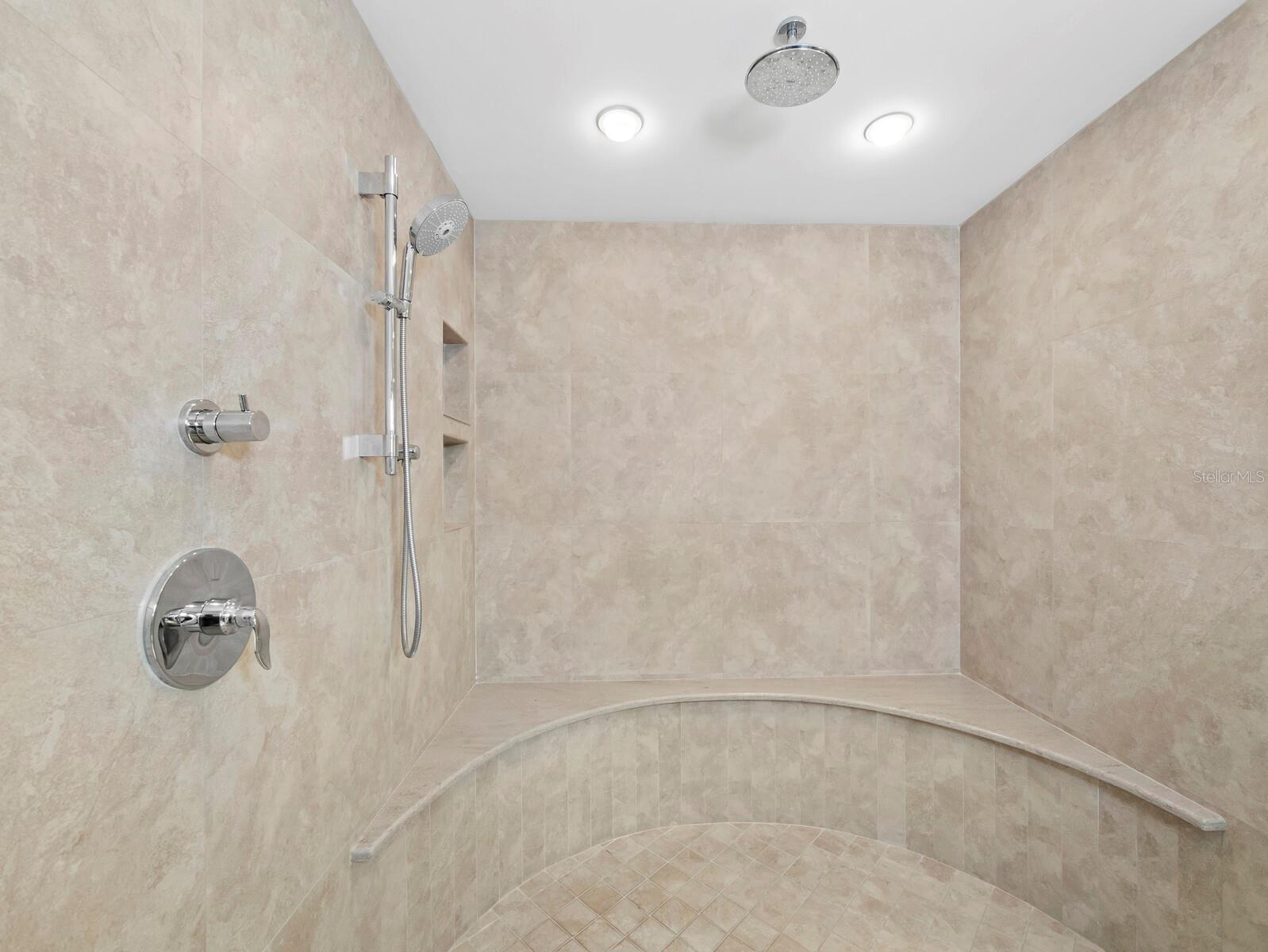 Unique walk-in shower highlights the Primary bath - 455 LONGBOAT CLUB RD #402, LONGBOAT KEY