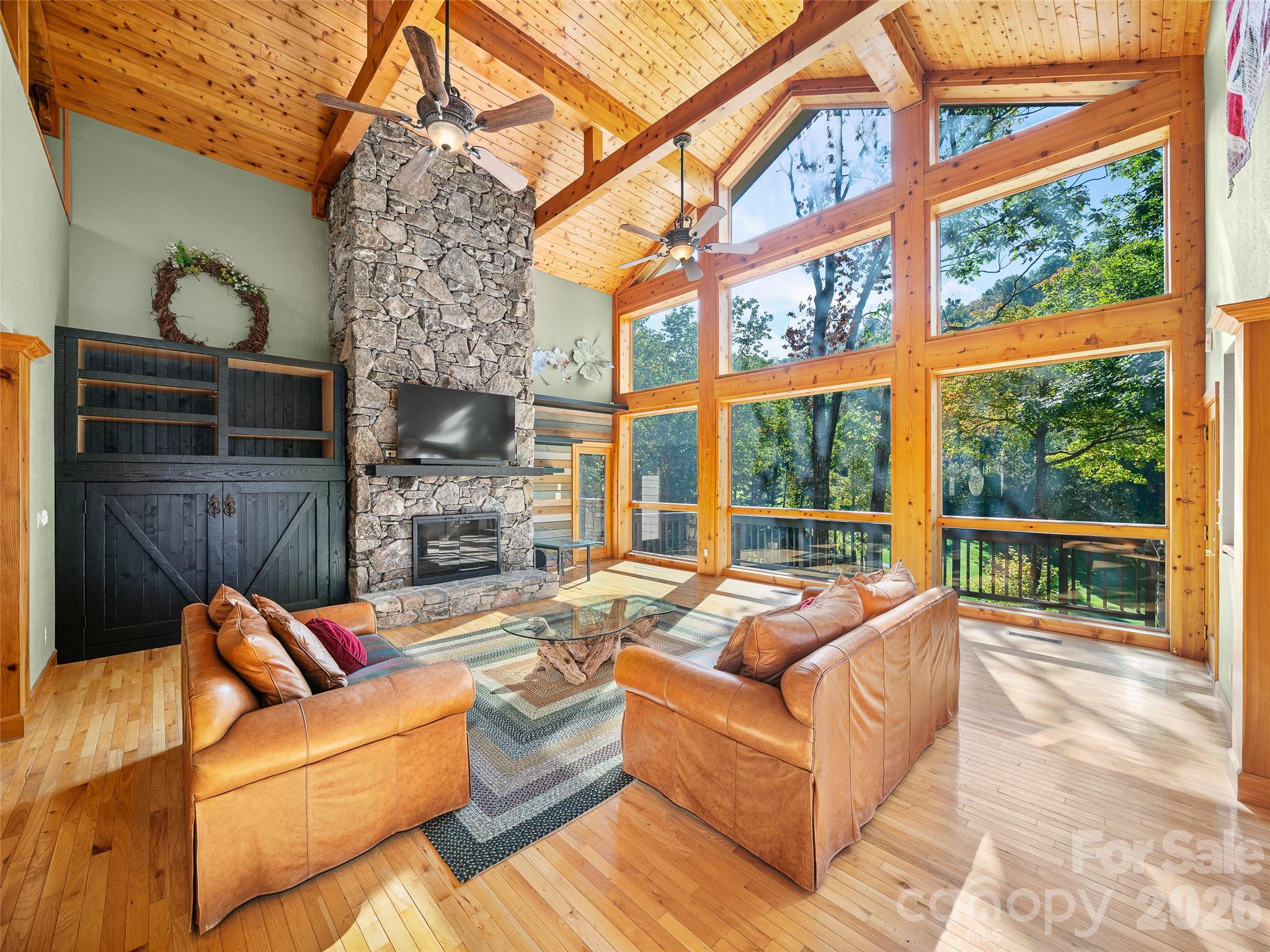 Newly updated photo highlights the furniture that remains with the home - 151 Austin Mountain Drive, Burnsville