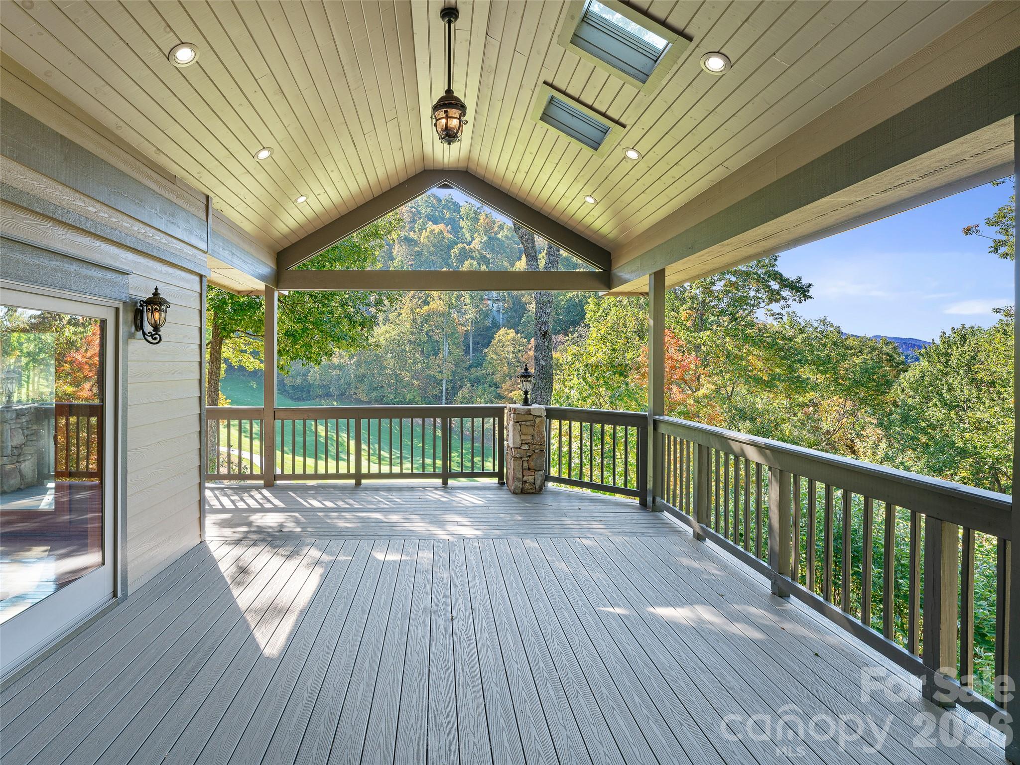 Expansive covered deck, perfect for gatherings rain or shine - 151 Austin Mountain Drive, Burnsville