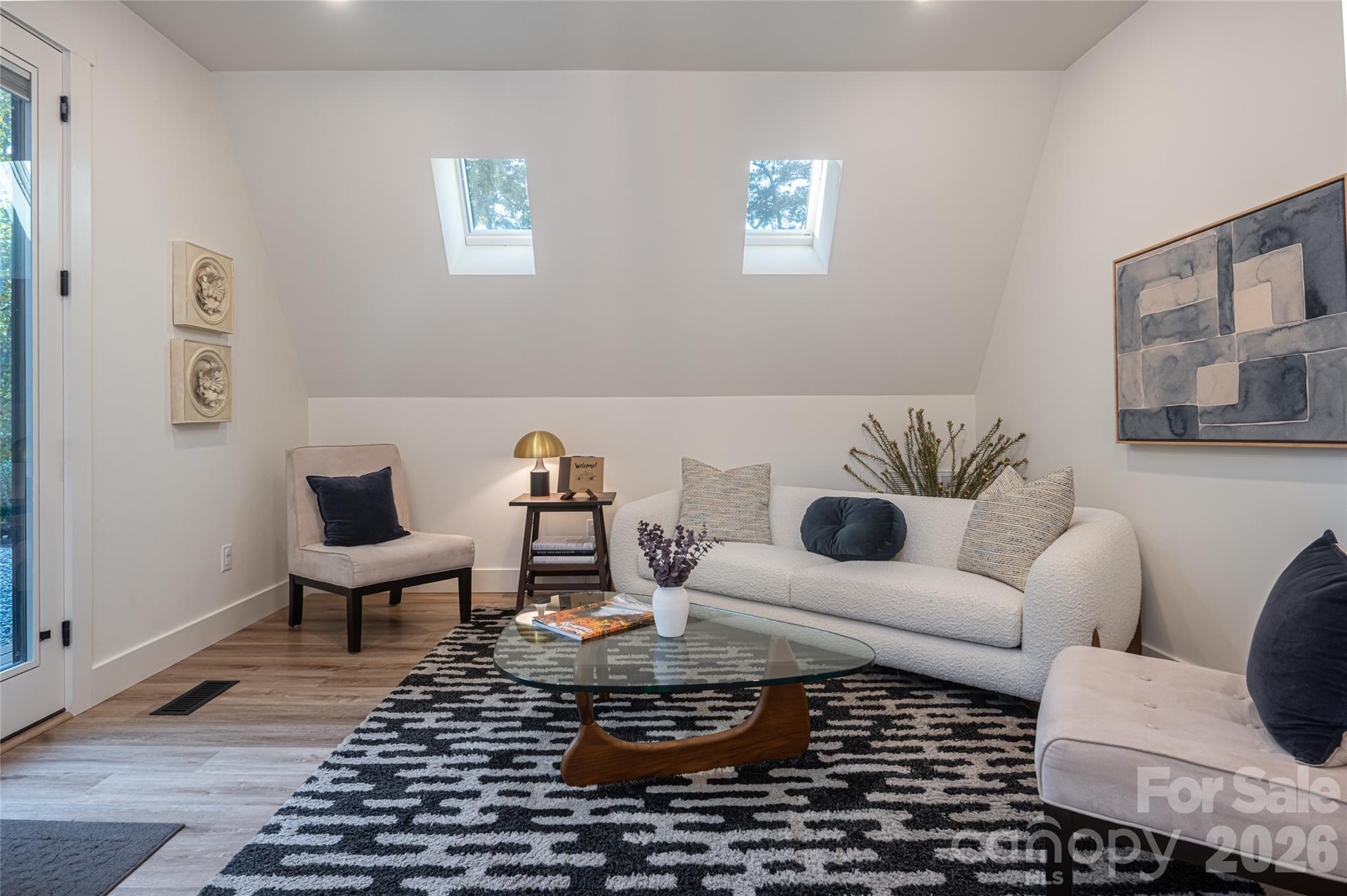 The foyer serves as a secondary sitting area - 125 Carolina Lily Lane, Asheville