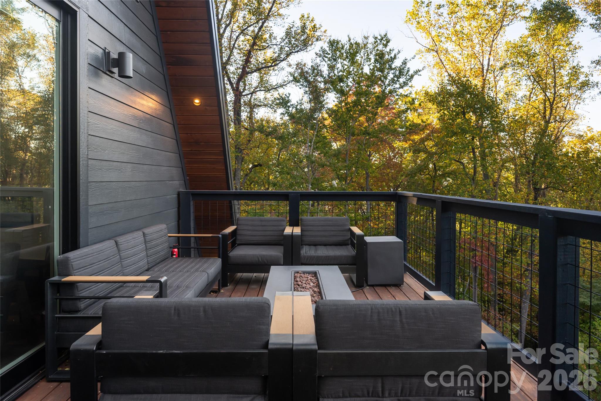 Sit fireside, surrounded by mature hardwoods on the back deck - 125 Carolina Lily Lane, Asheville