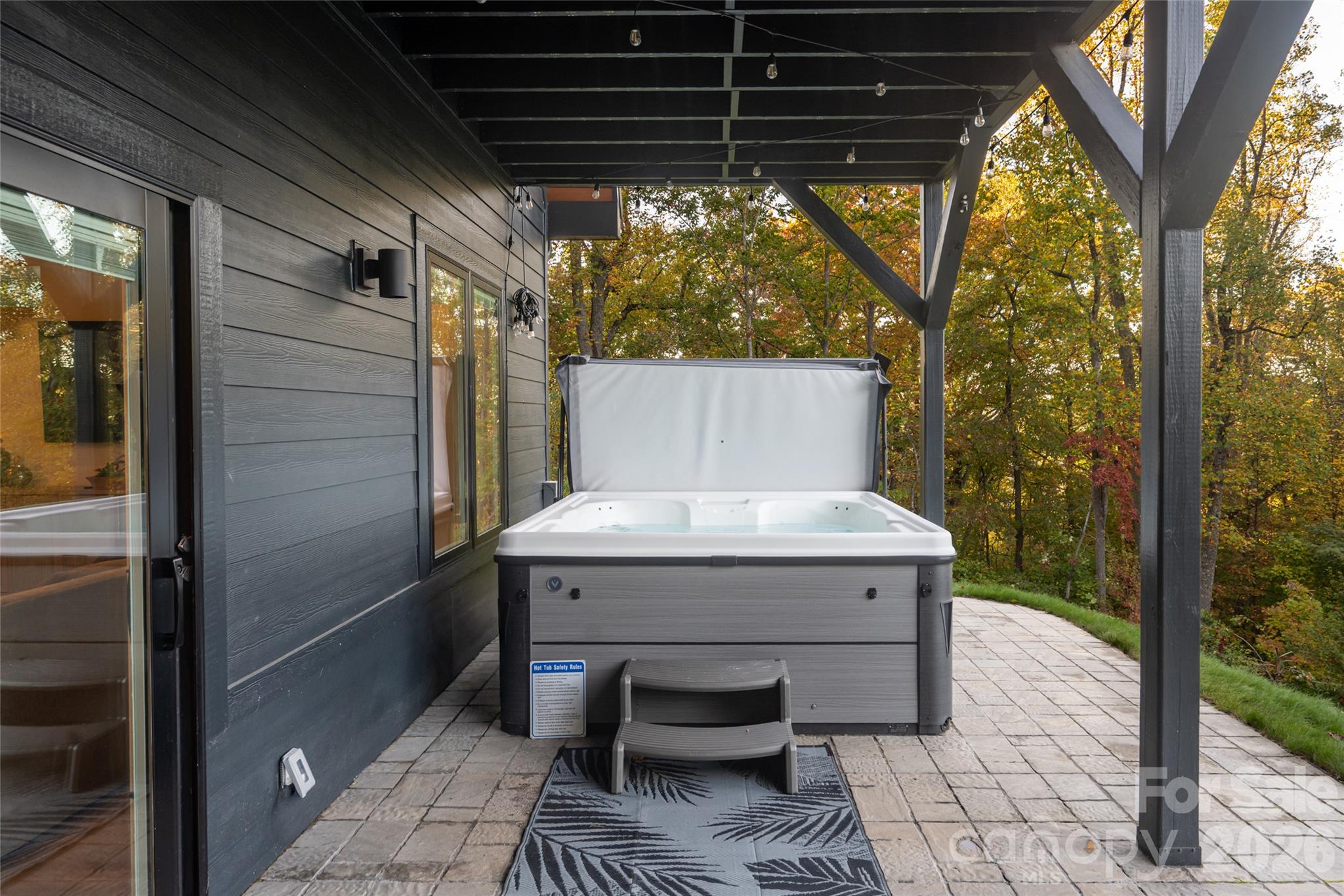 Lower level patio with hot tub - 125 Carolina Lily Lane, Asheville