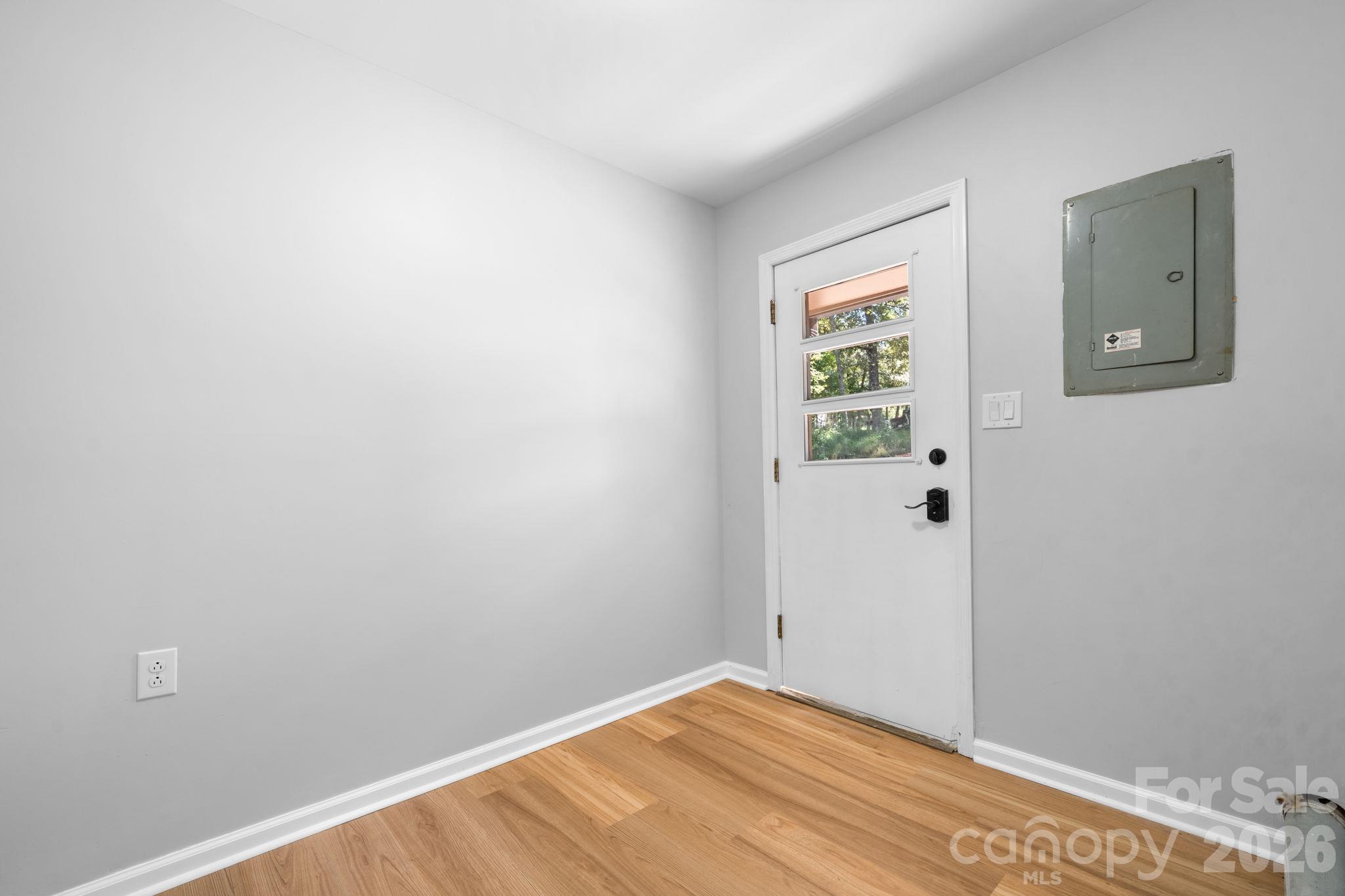 side door with laundry - 4024 Wandering Lane, Hickory