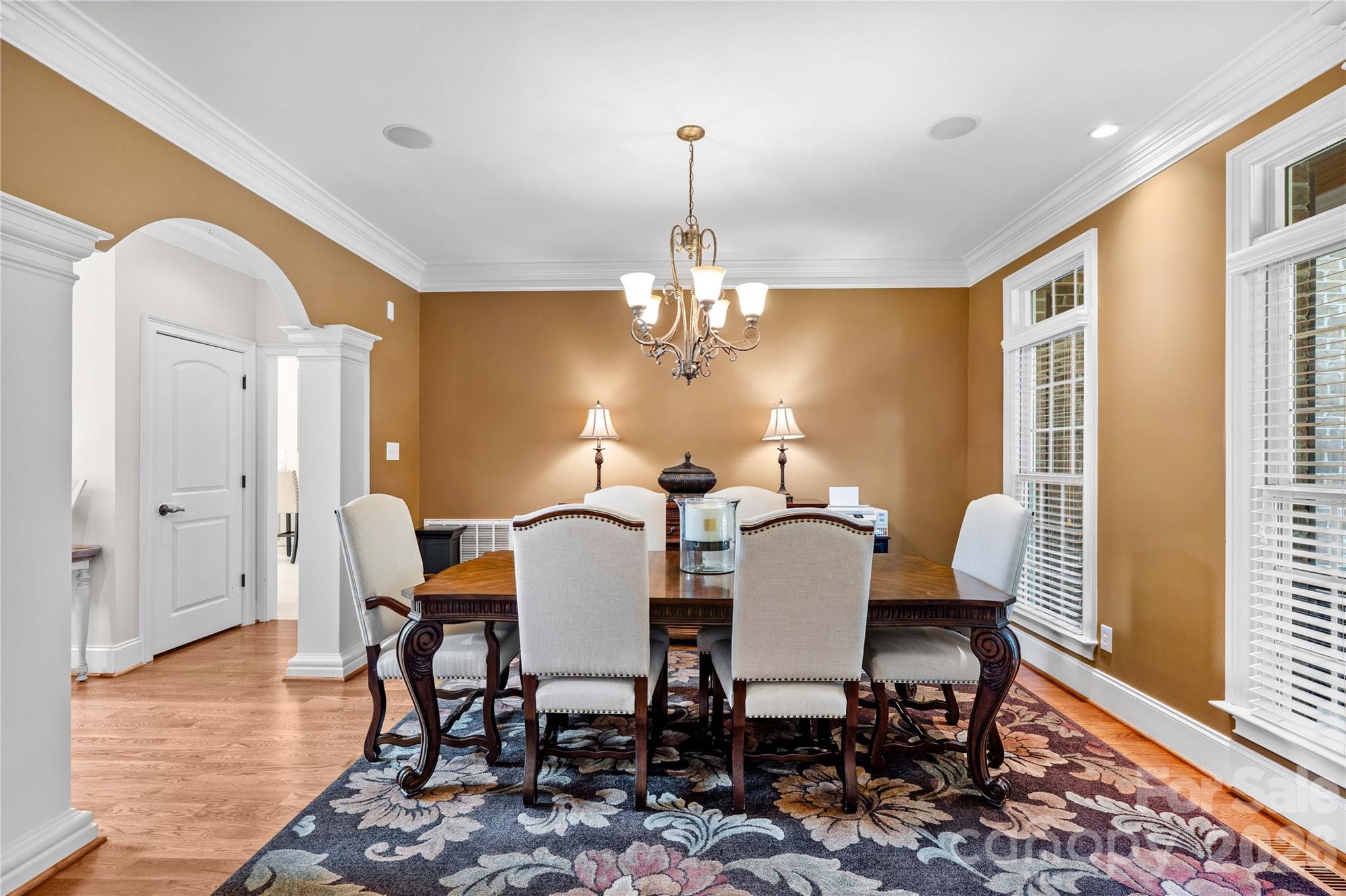 Dining room features arched entrances and moldings/columns - 220 Cedar Lake Drive, Statesville