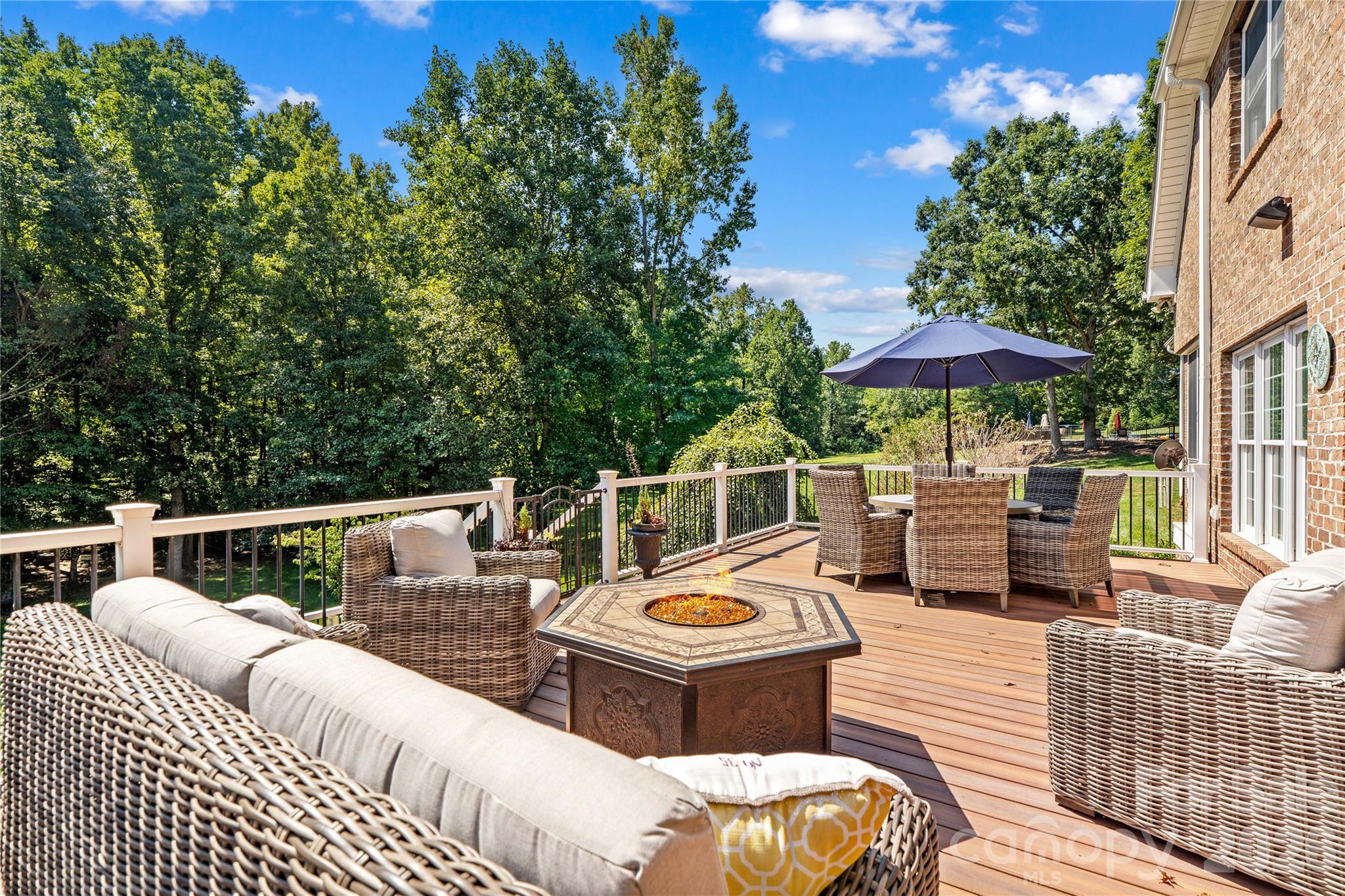 Deck that overlooks private backyard - 220 Cedar Lake Drive, Statesville