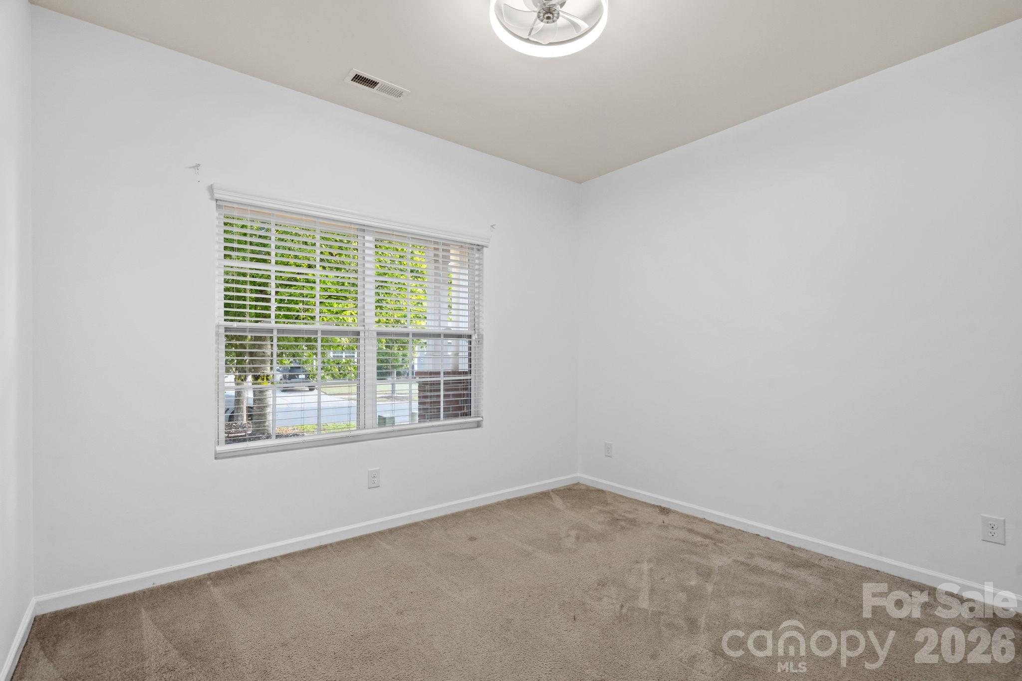Bedroom 2 on main level - 1555 Spring Blossom Trail, Fort Mill