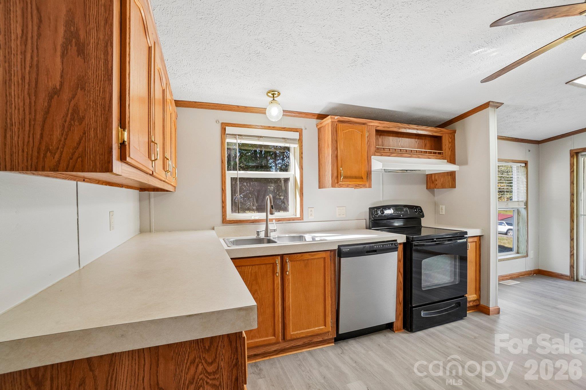 Note the ample counter space and storage cabinetry. - 202 Banyan Road, Candler