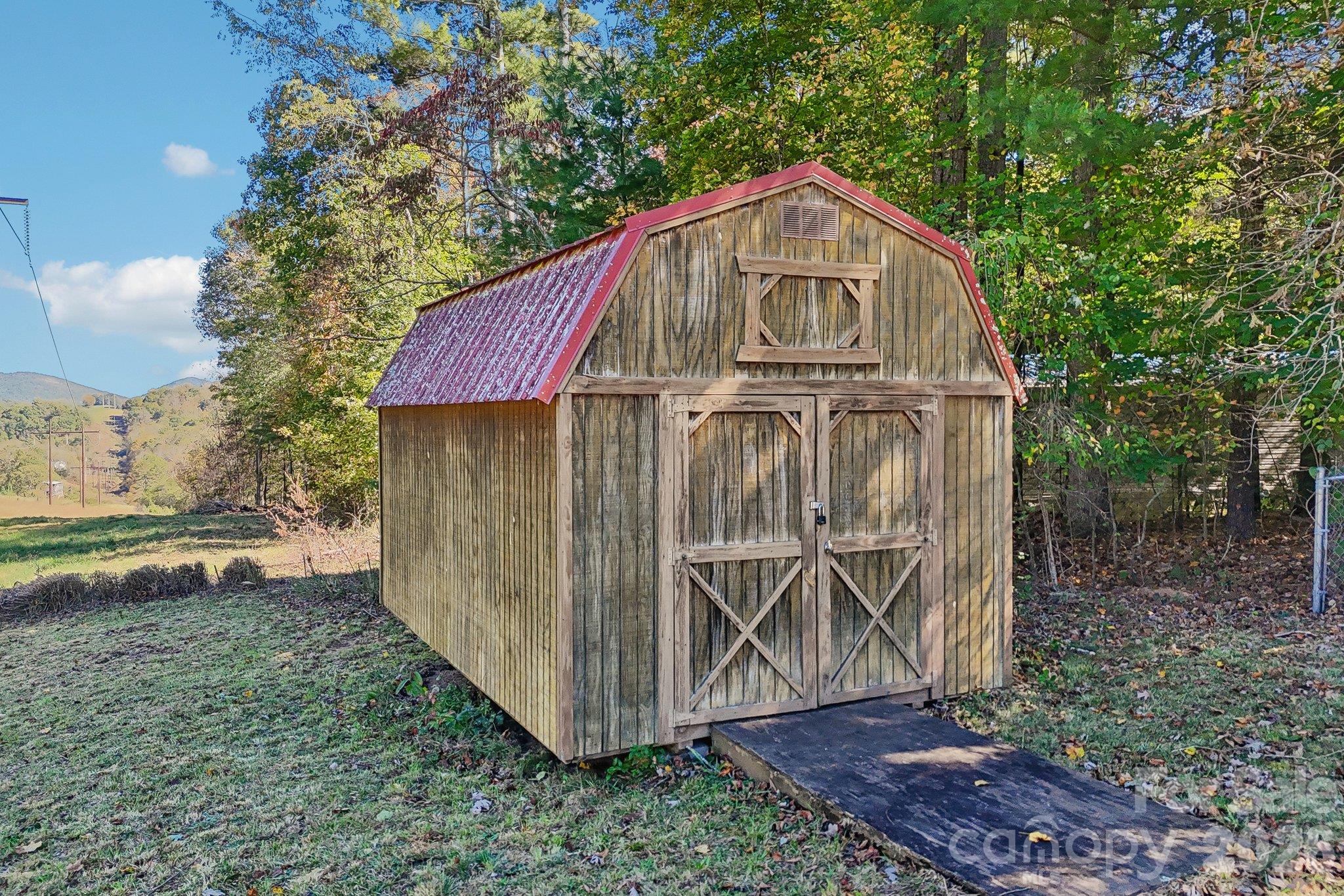 A final feature is the outdoor shed, approximately 18' x 12'. - 202 Banyan Road, Candler