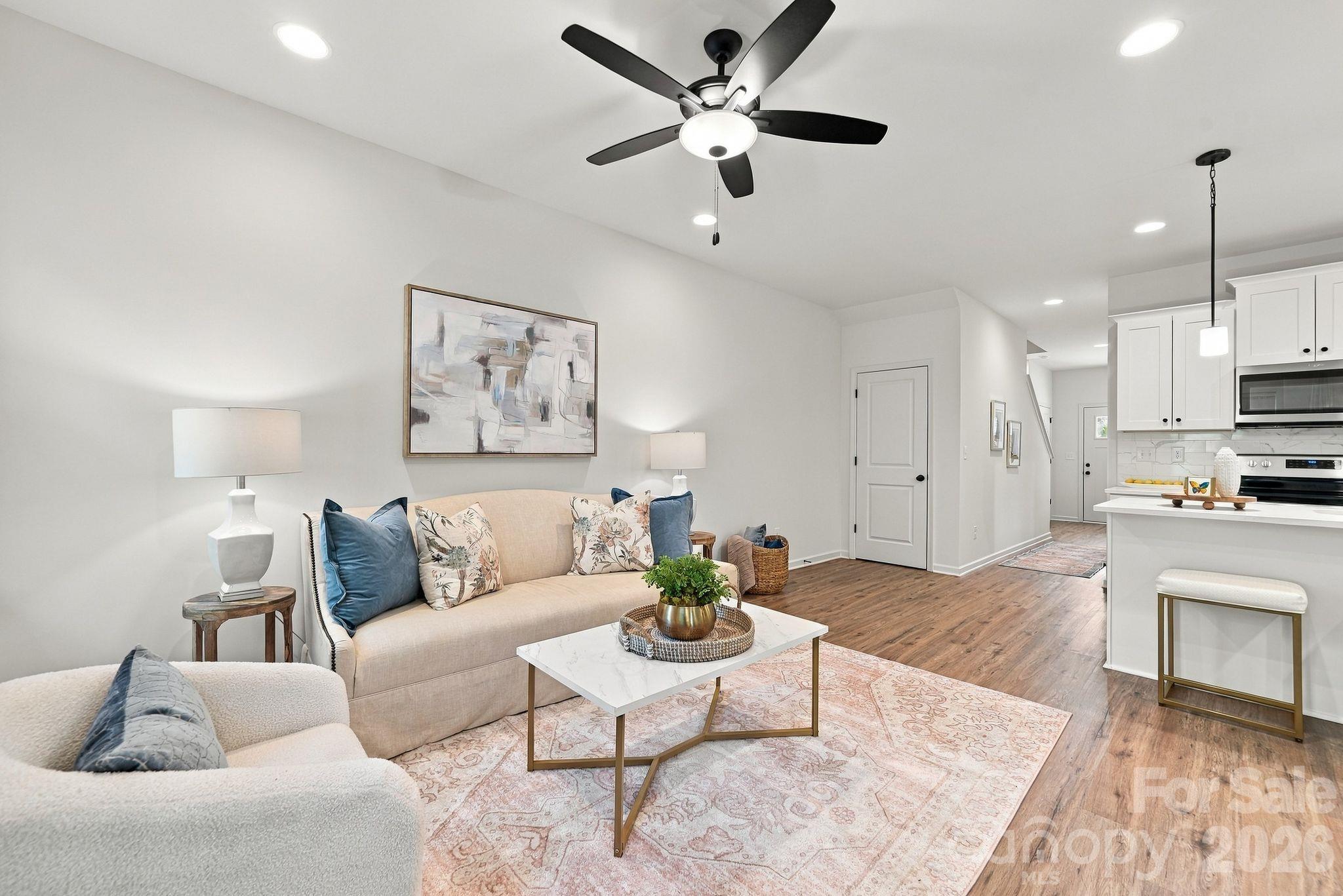 Open floor plan combines living area with kitchen for entertaining and flow - 4715 Crestmont Drive, Charlotte