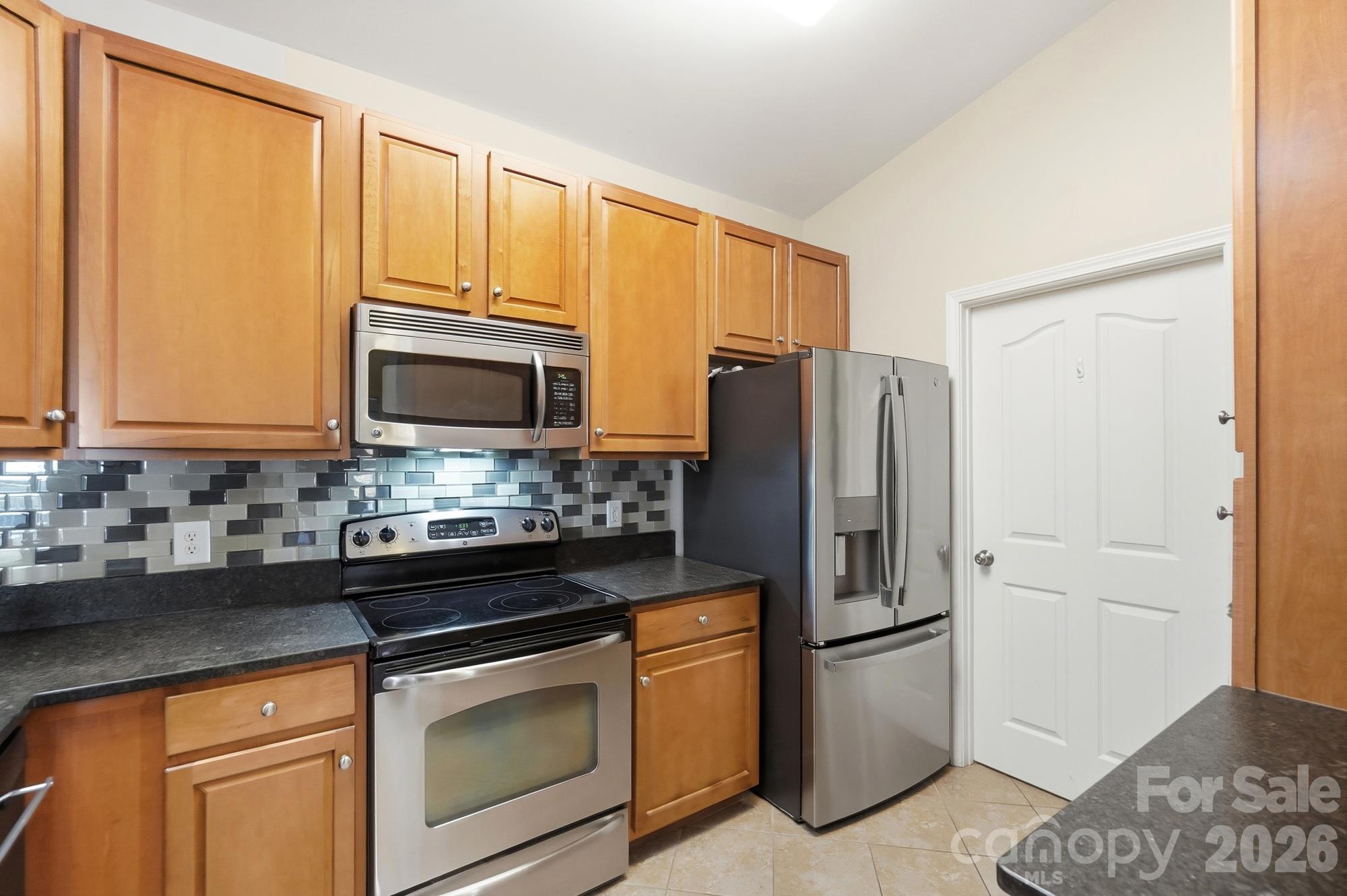 Kitchen w/ Stainless Steel Appliances - 16752 Amberside Road, Cornelius