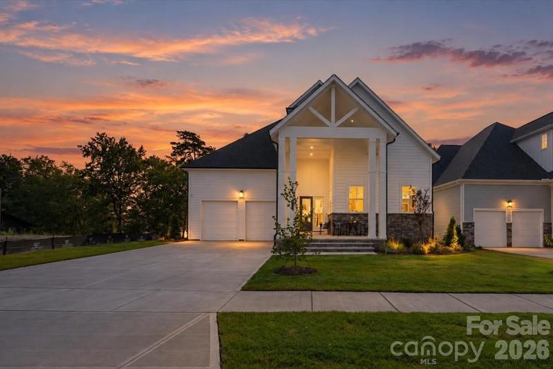 Welcome home to 4531 Splash Trail. Twilight enhanced facade. - 4531 Splash Trail, Sherrills Ford