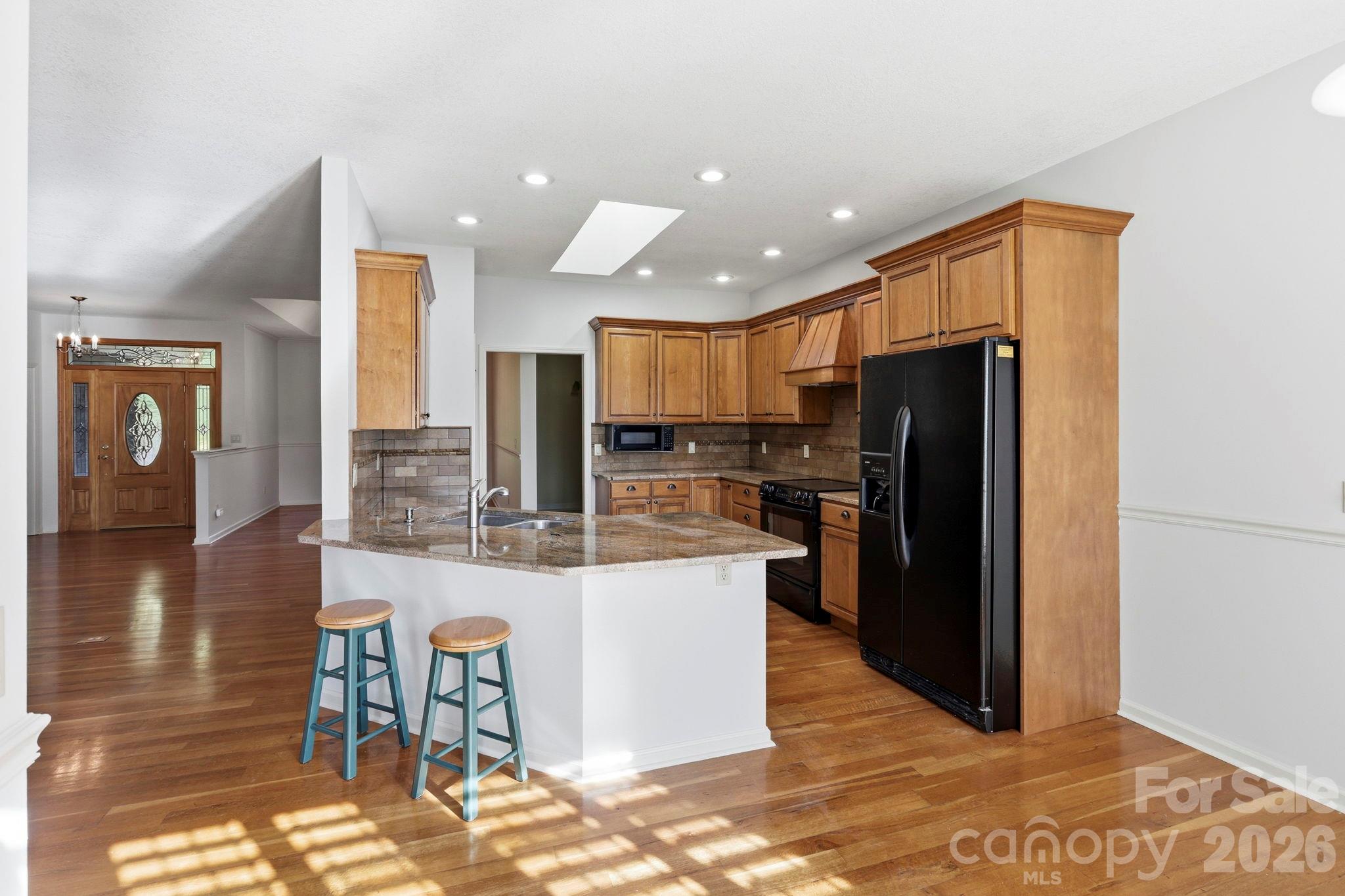 Eat in Kitchen, Breakfast Bar, and Open Kitchen - 17 Ashton Forest Court, Hendersonville