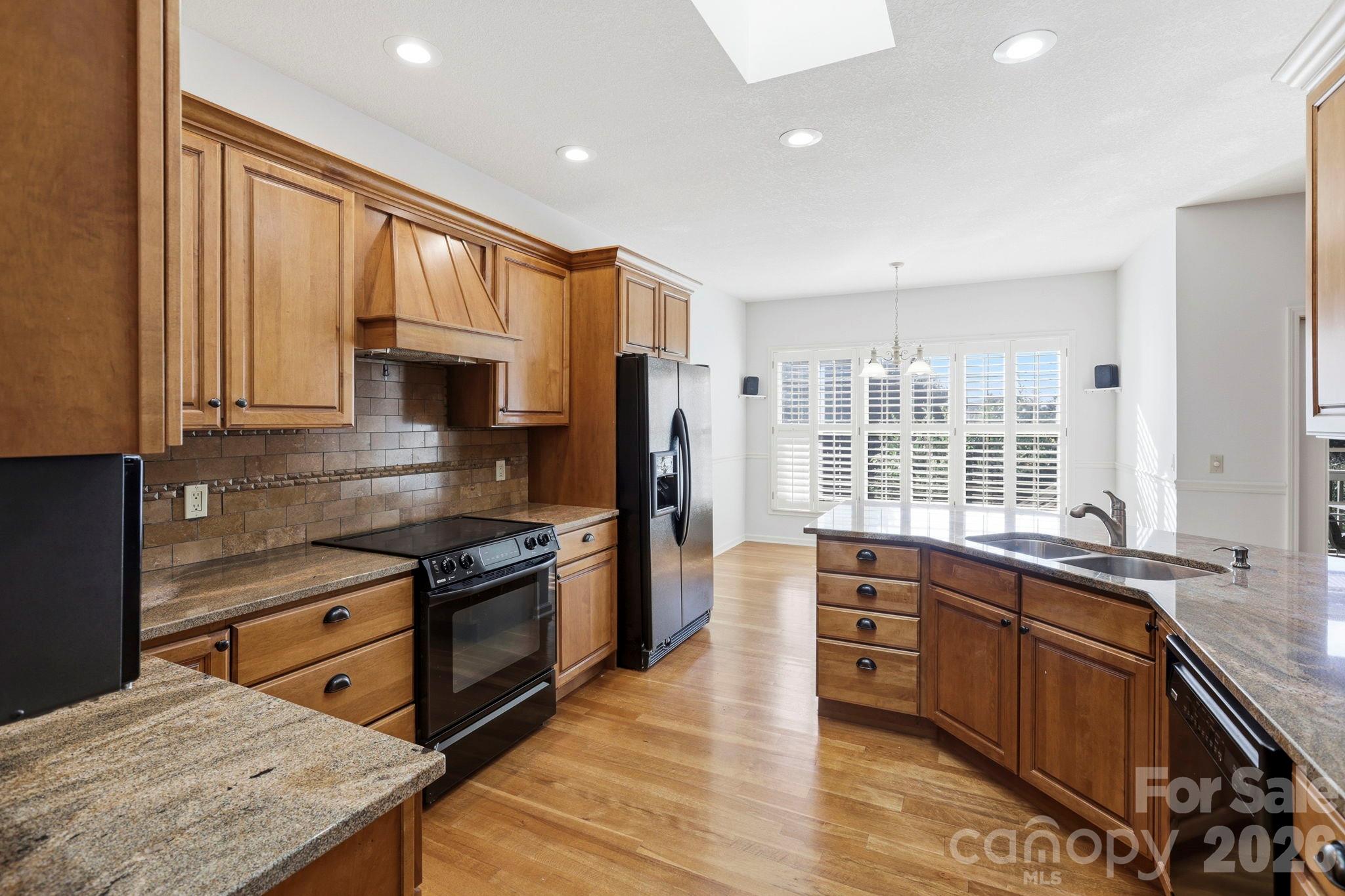 Kitchen with Ample Storage and Sky Light - 17 Ashton Forest Court, Hendersonville