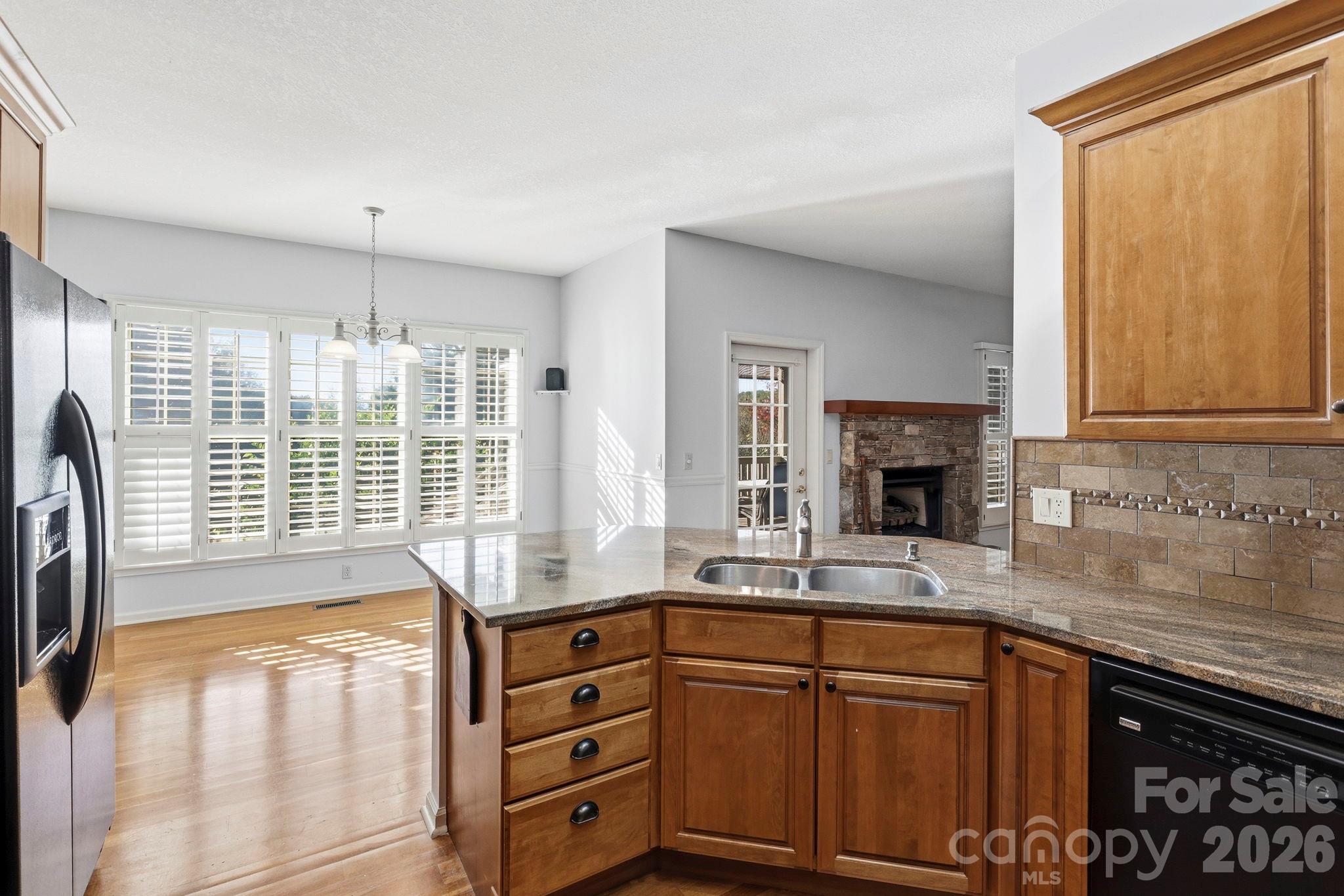 Kitchen into Eat In Dinning Area and Living Room - 17 Ashton Forest Court, Hendersonville