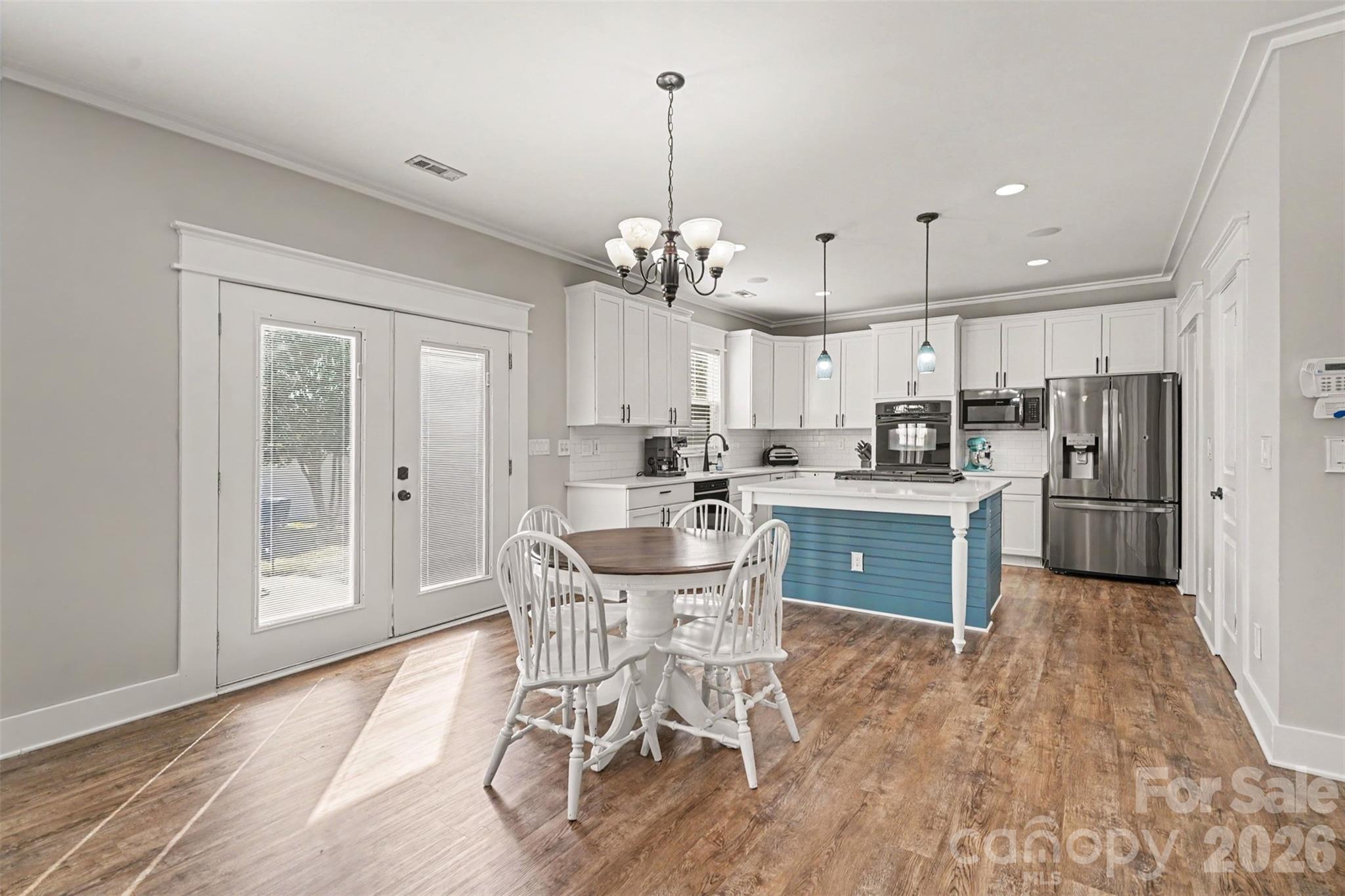 Love this Open Floorplan... Spacious Dining Area...this has a 4 top table but could easily hold a 6 top table. Beautifully Updated Kitchen.. - 3585 Leighton Drive SW, Concord