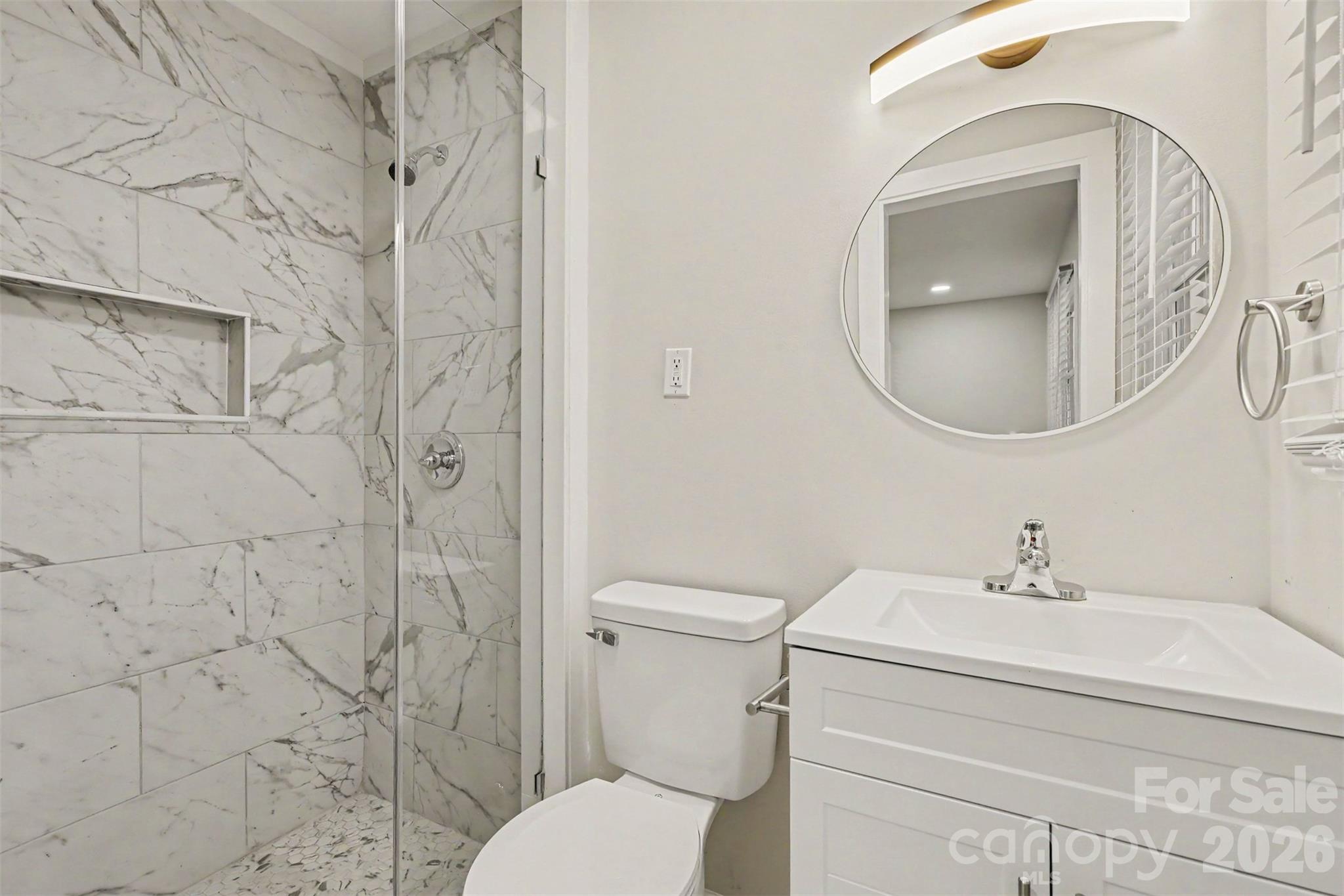 Renovated primary bathroom - 519 Amon Lane, Pineville