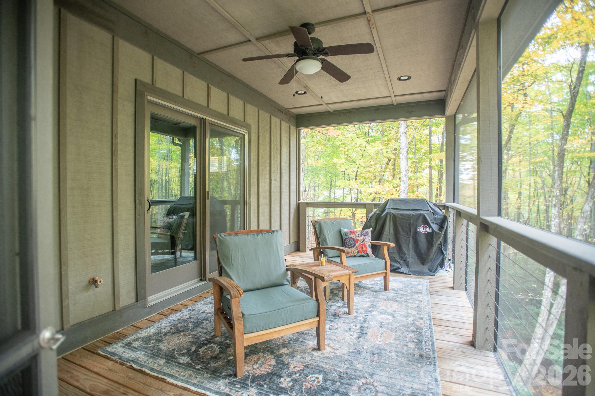 Guest Bedroom section of upper screened porch - 350 Celo Cove Drive, Burnsville