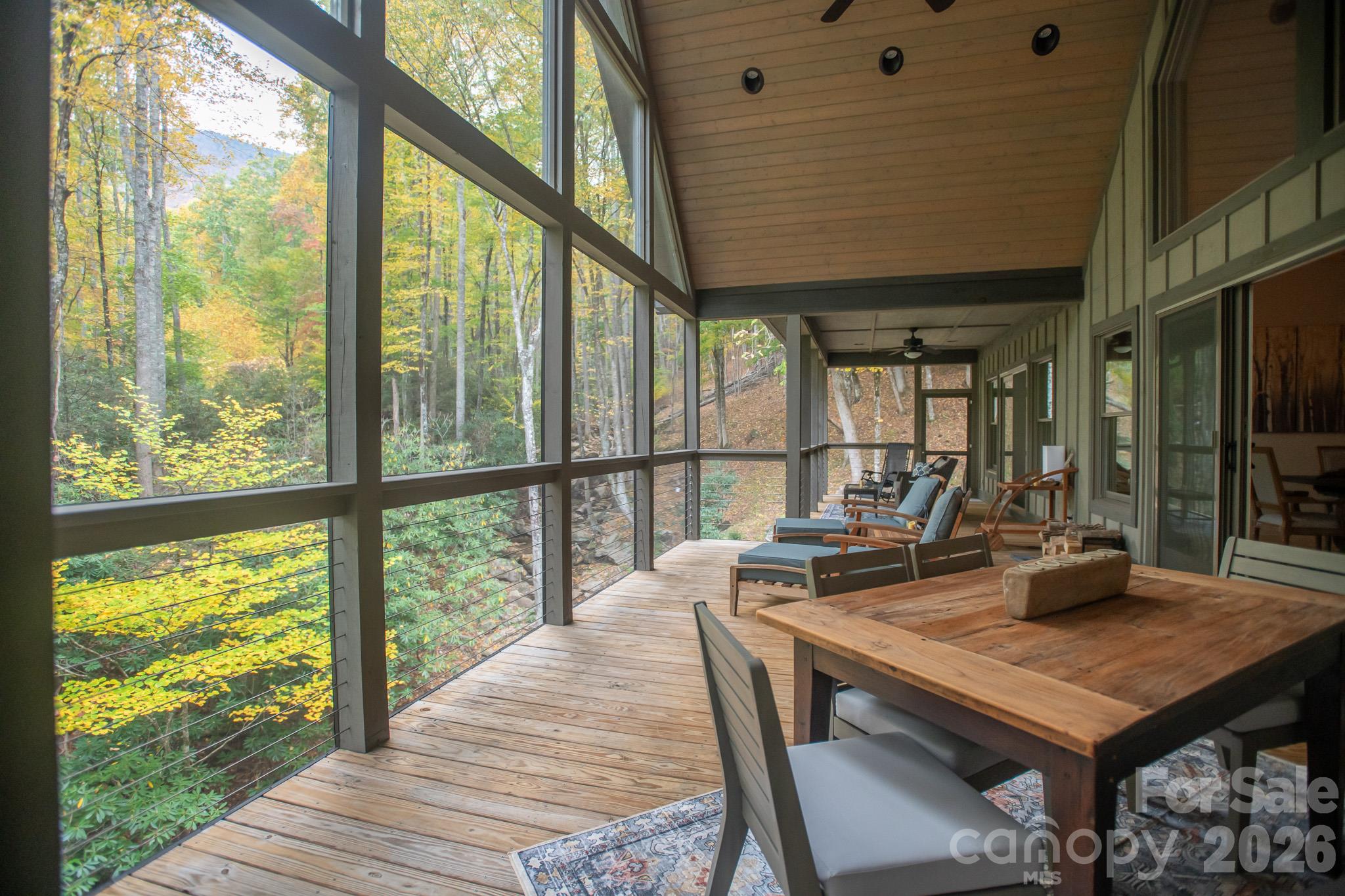 Upper screened porch with fireplace - 350 Celo Cove Drive, Burnsville