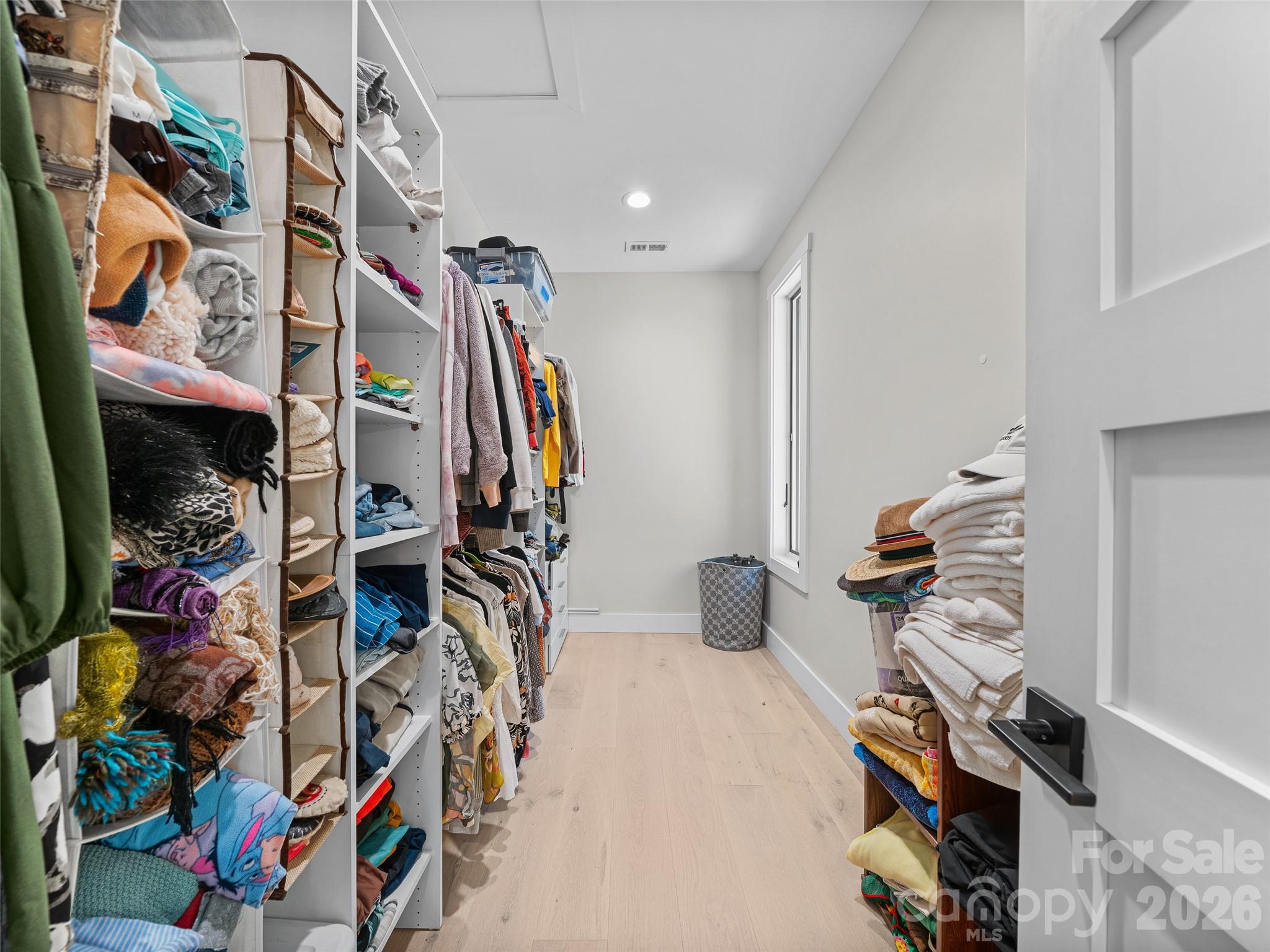 Primary Bedroom Walk-In Closet - 1136 Elk Shoals Creek Road, Burnsville