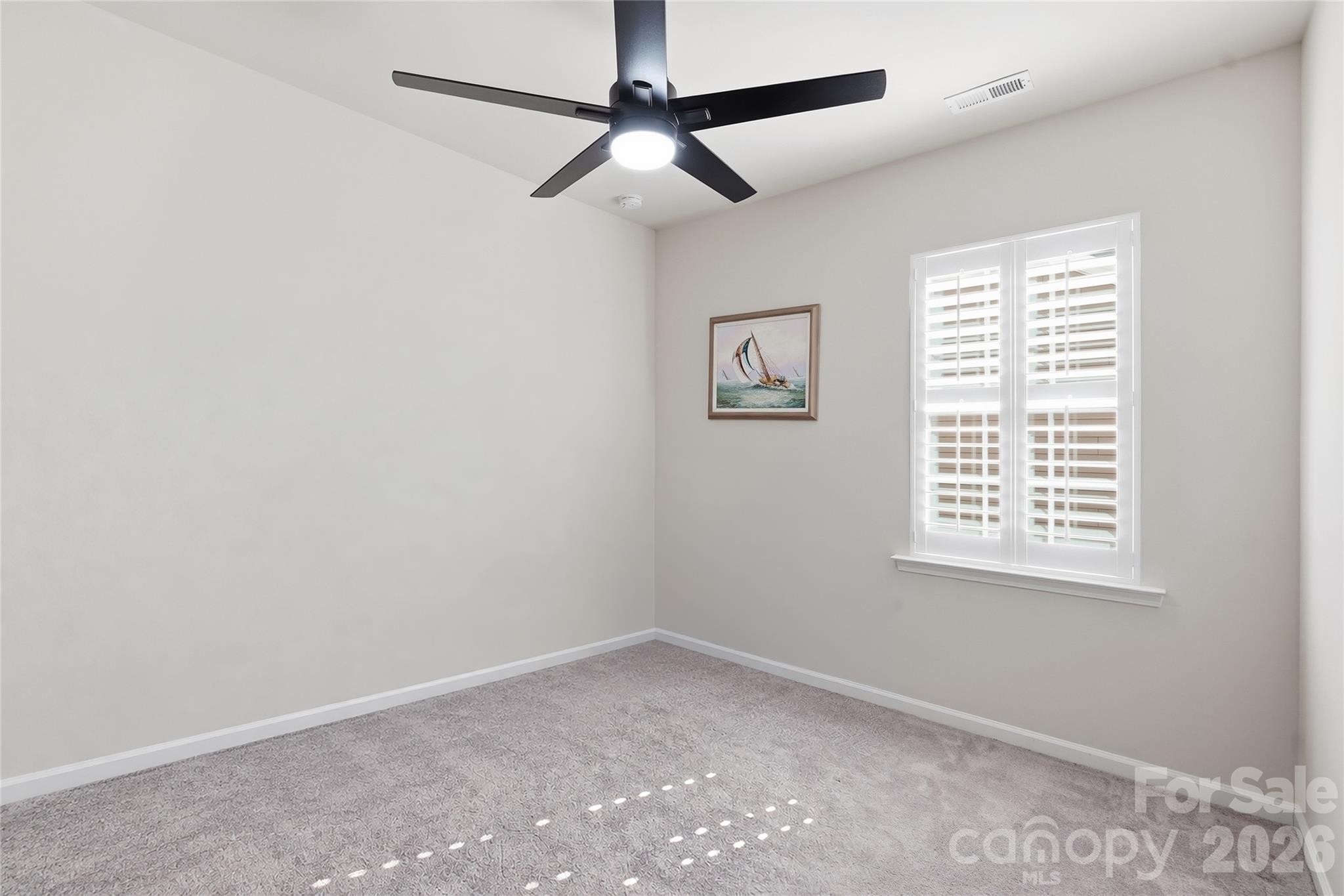 Bedroom #3 with upgraded ceiling fan - 3162 Windhaven Lane, Tega Cay