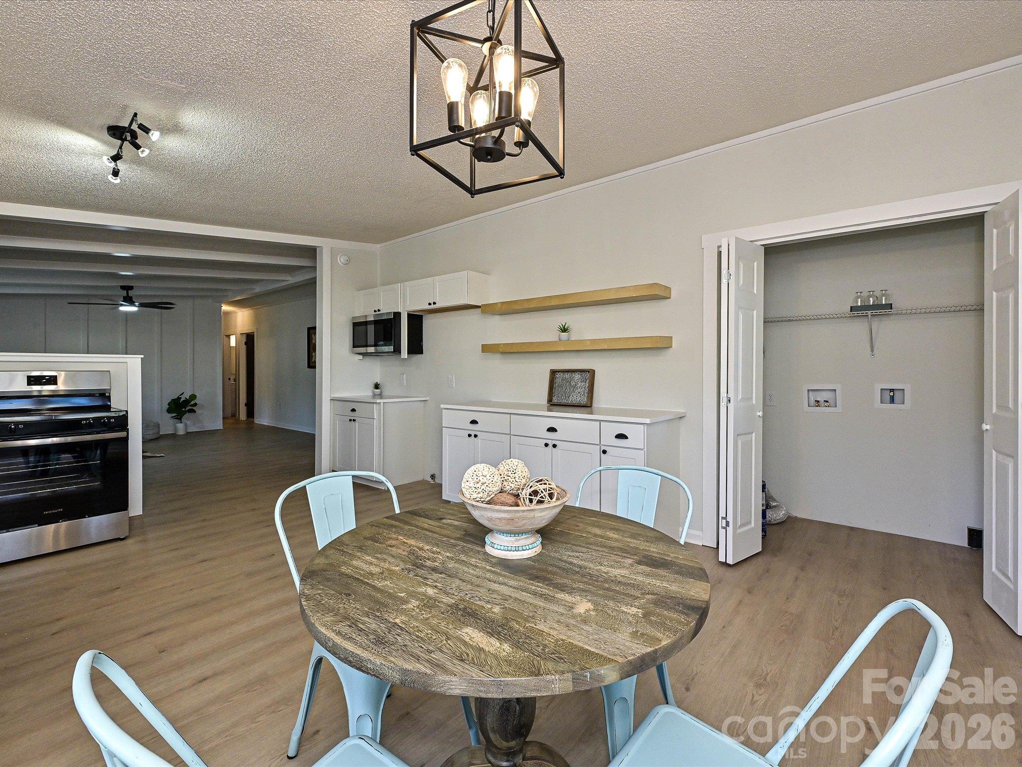 View of breakfast area to open kitchen. - 1711 Trexlar Avenue, Gastonia