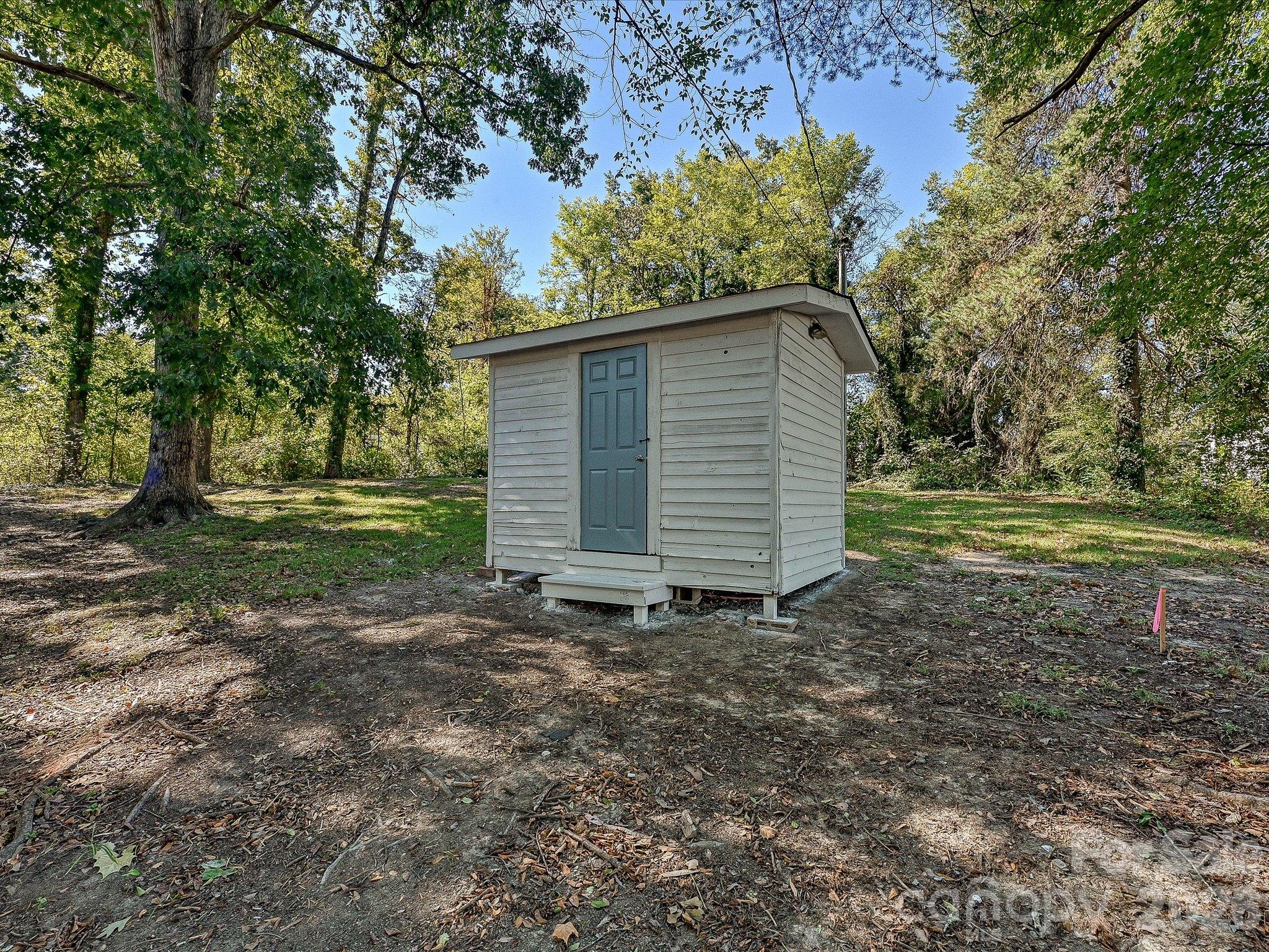 View of existing shed and backyard. - 1711 Trexlar Avenue, Gastonia