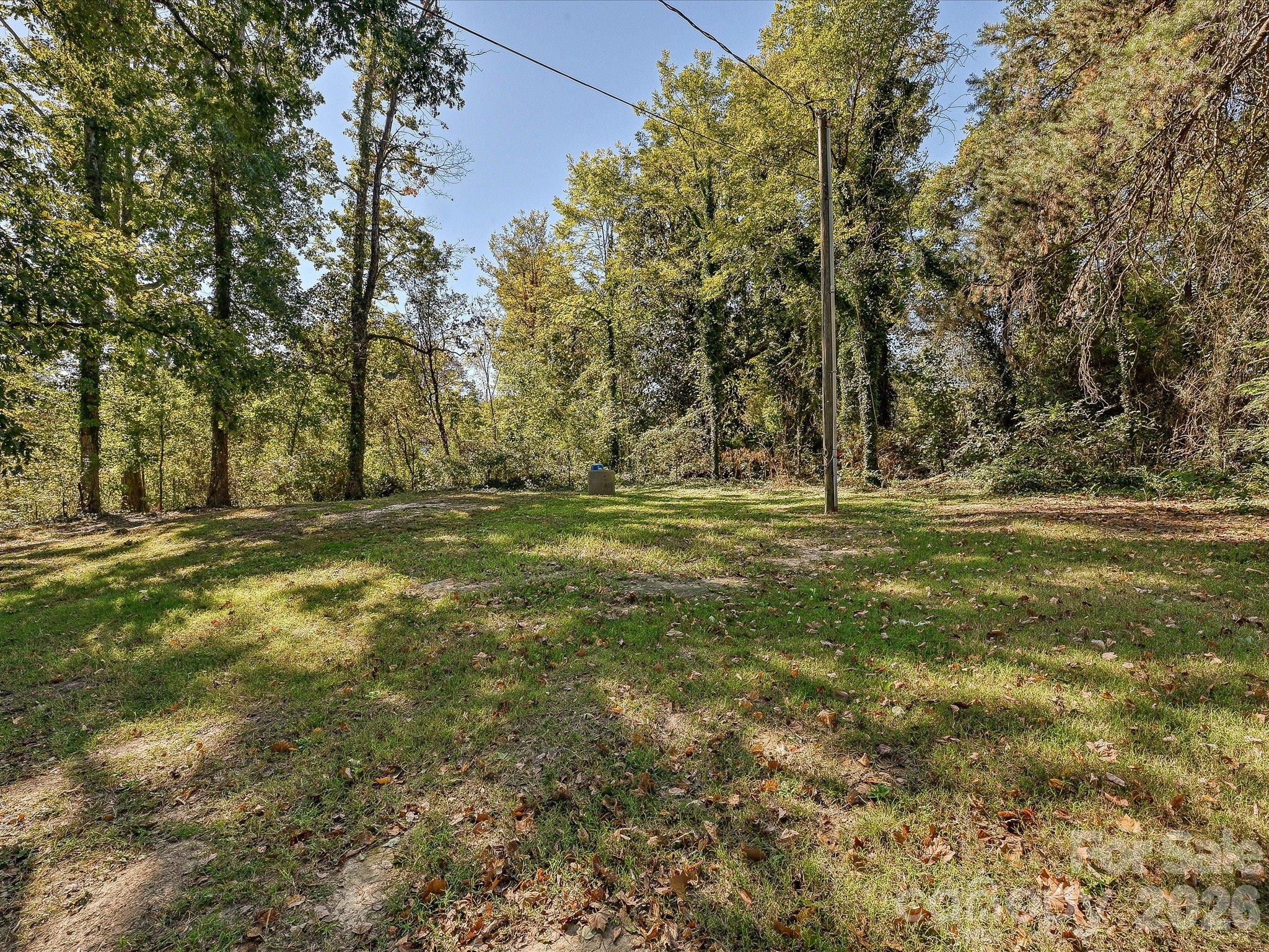 View of large backyard. - 1711 Trexlar Avenue, Gastonia