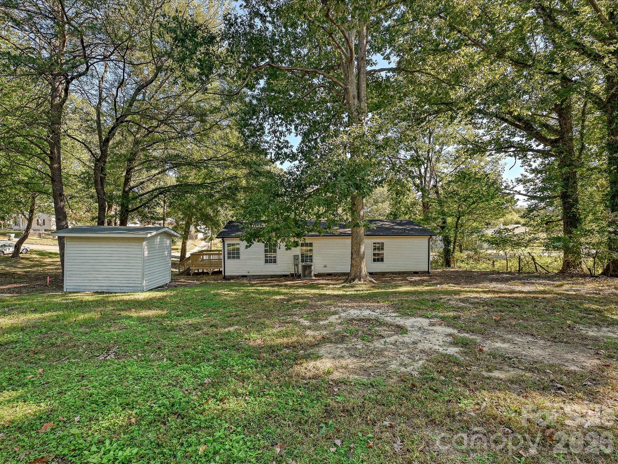 View of home from the rear of the backyard. - 1711 Trexlar Avenue, Gastonia