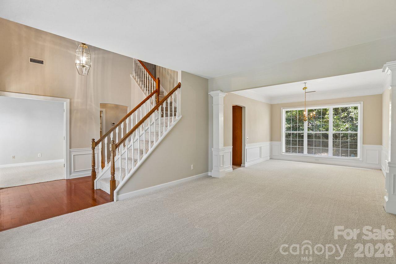 Front living space with dining room - 704 Meadow Lake Drive, Matthews