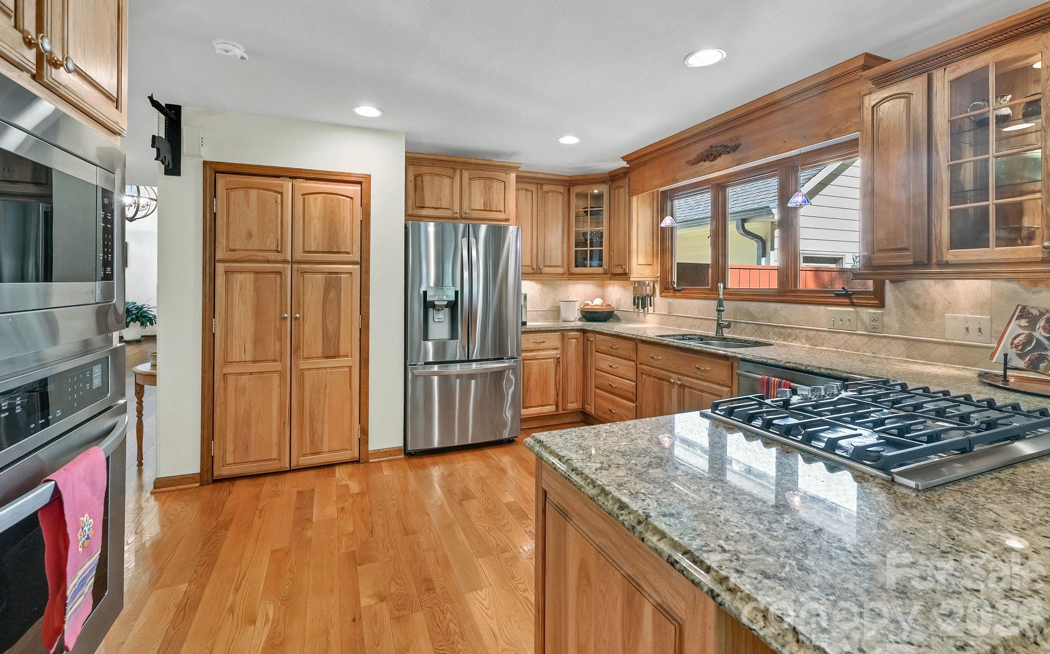 Kitchen featuring stain less steel appliances - 52 Oak Gate Drive, Hendersonville