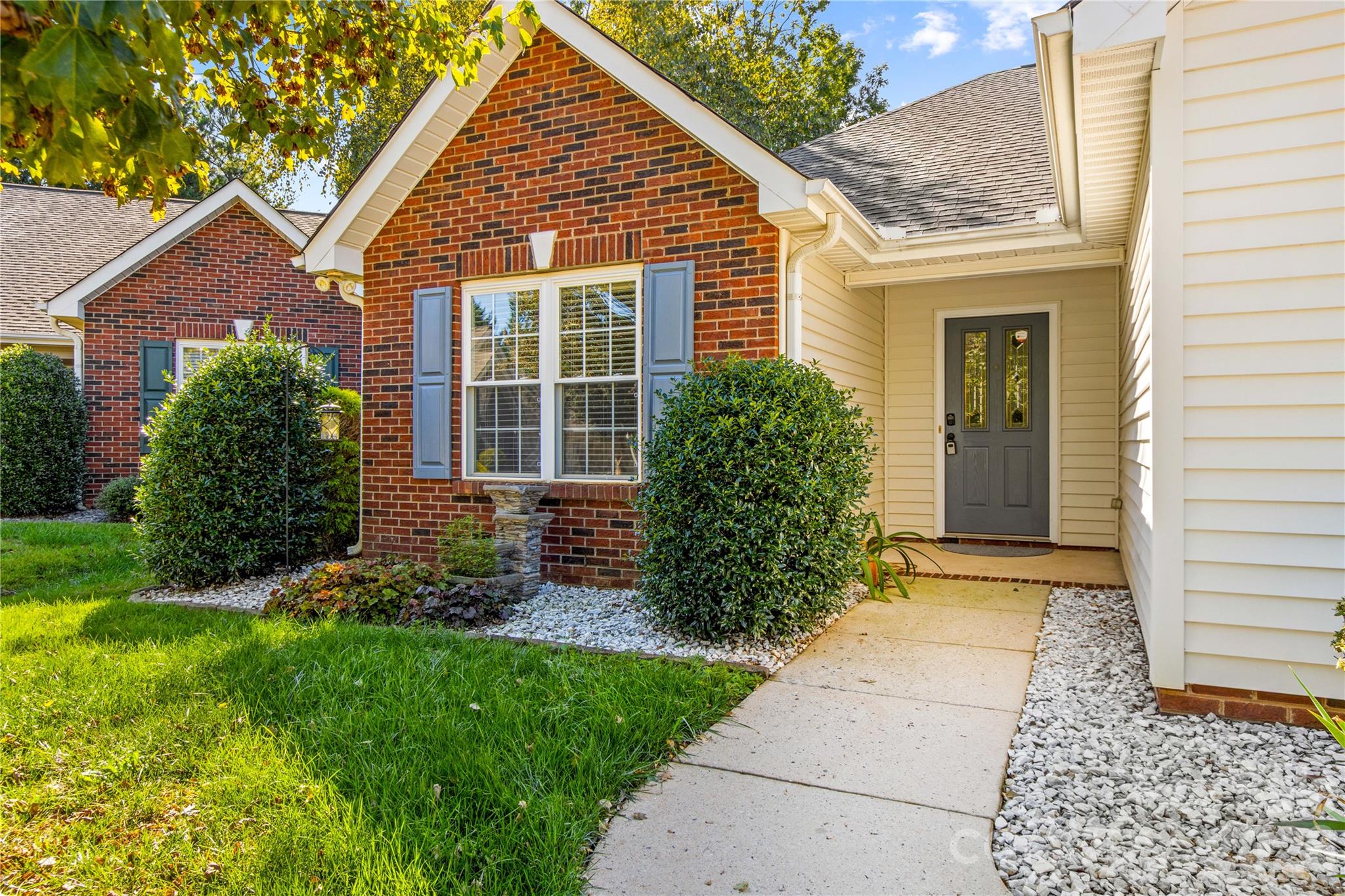 Level entry at Covered Front Porch - 117 Abbotswood Place, Mooresville