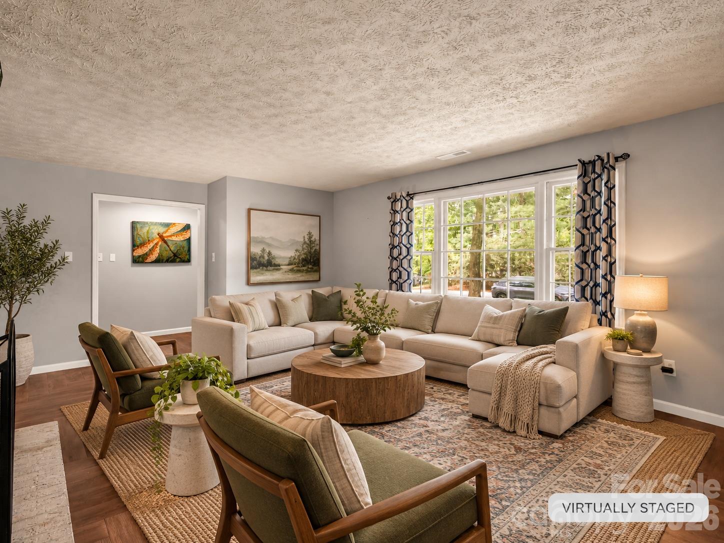 beautiful light filled living room w/ gas fireplace. items virtually removed and then virtually staged. - 92 Greenwood Acres Drive, Mills River