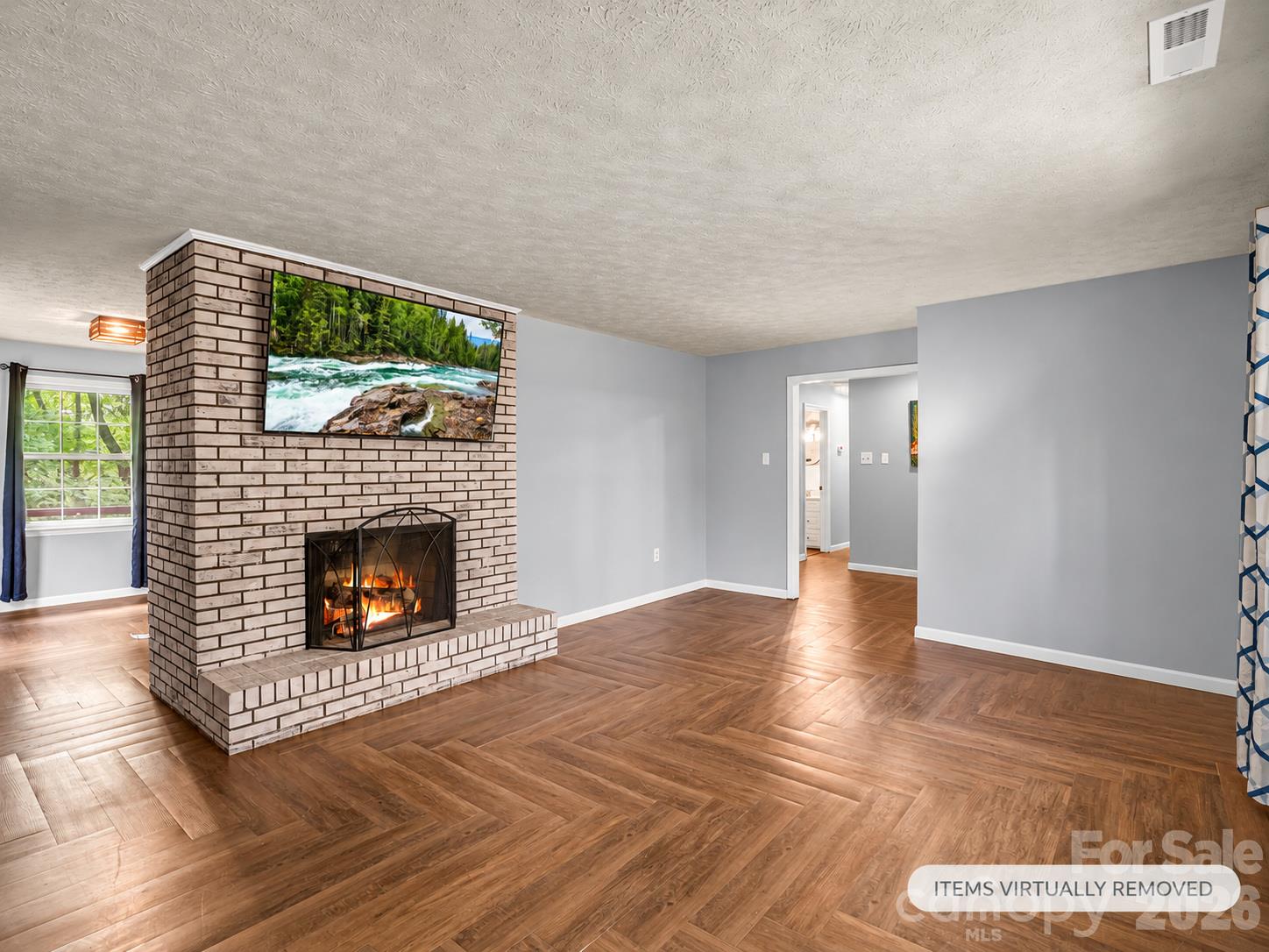 gorgeous fire place and light filled living room - 92 Greenwood Acres Drive, Mills River