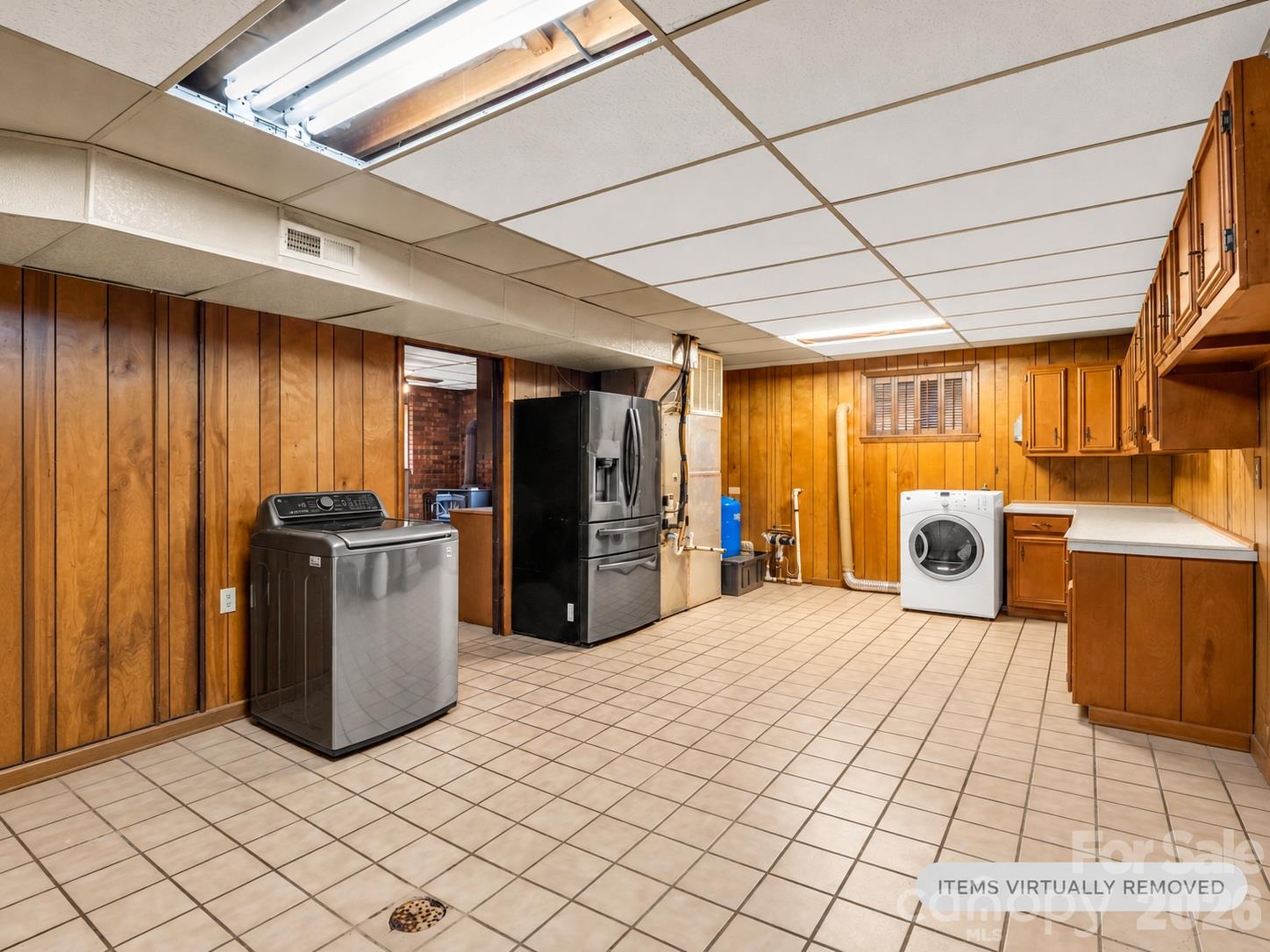 huge laundry & storage area in basement - 92 Greenwood Acres Drive, Mills River