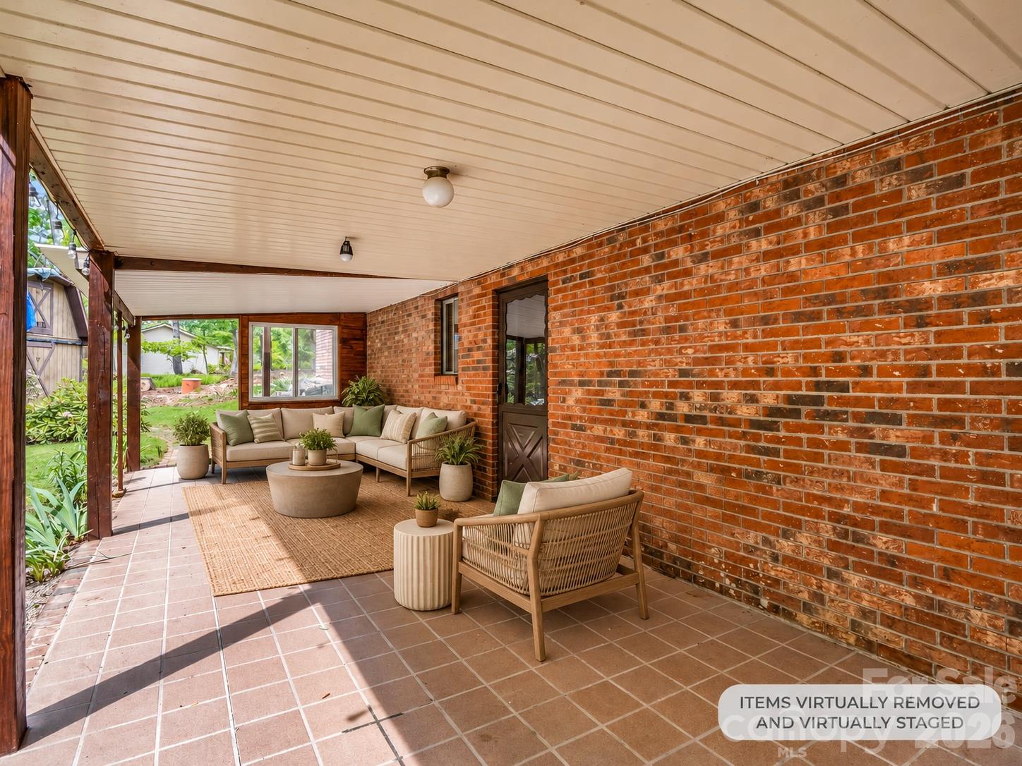 lower level covered porch - 92 Greenwood Acres Drive, Mills River