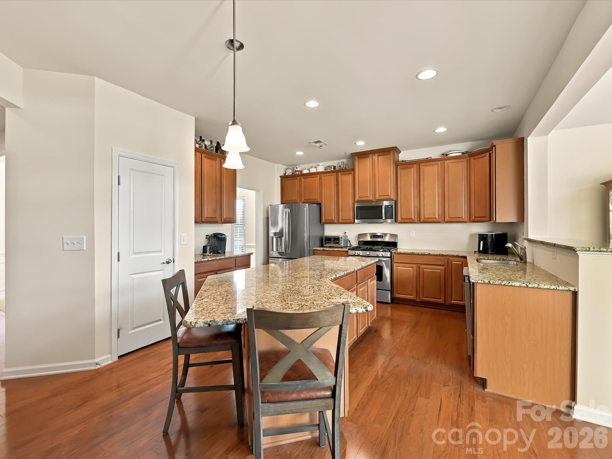 Single Family Residence at 11606 Warfield Avenue, Huntersville, photo 11 of 48