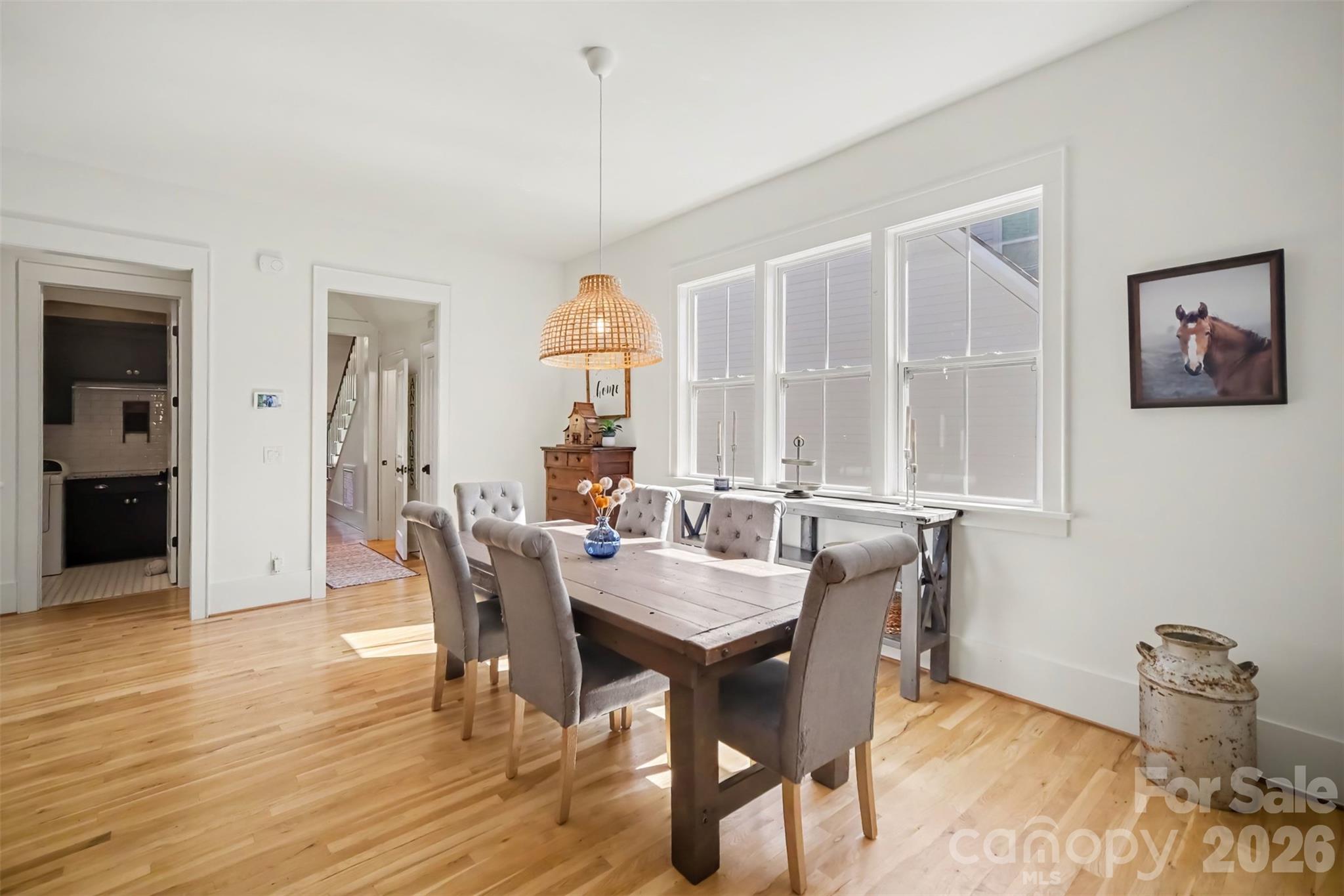 Dining room with large windows - 206 June Bug Lane, Fort Mill