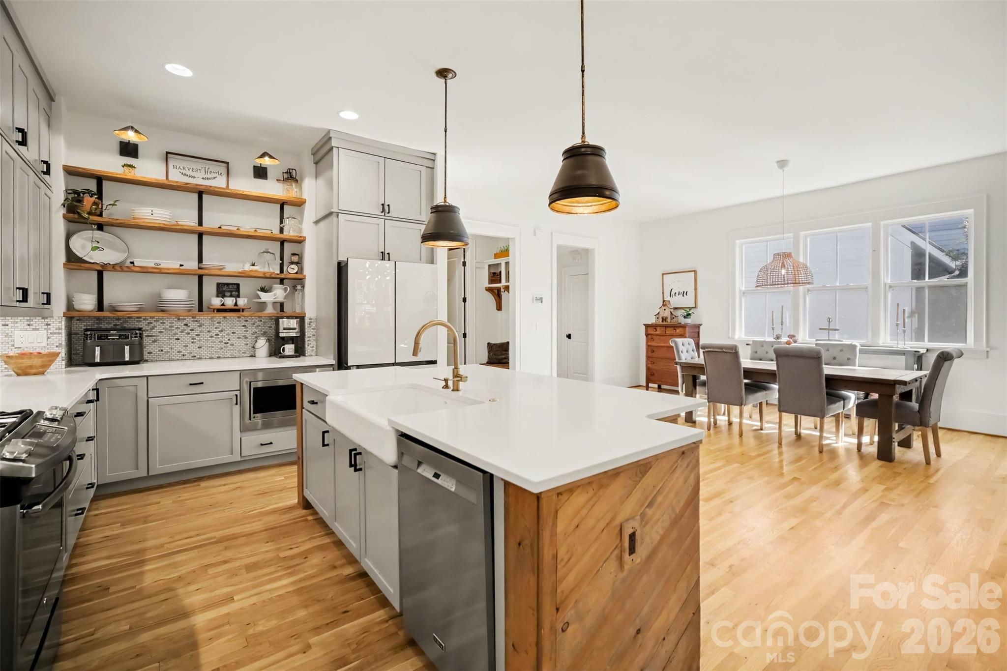 Kitchen with island and counter seating - 206 June Bug Lane, Fort Mill
