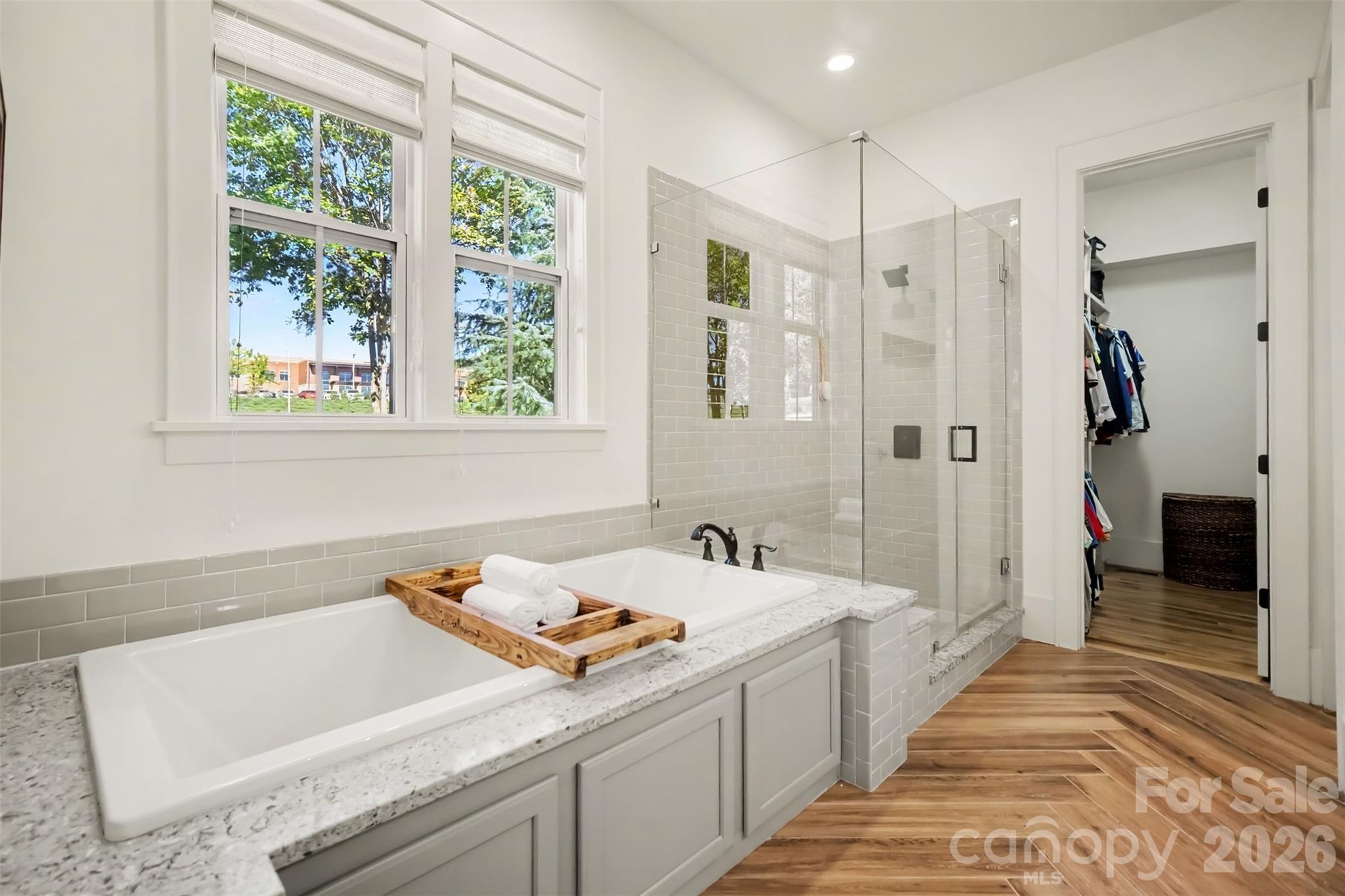 Primary Bathroom with double vanity, large shower and garden tub - 206 June Bug Lane, Fort Mill