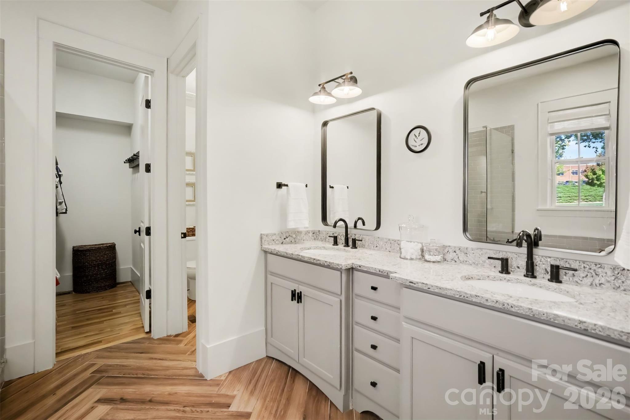 Primary Bathroom with double vanity, large shower and garden tub - 206 June Bug Lane, Fort Mill