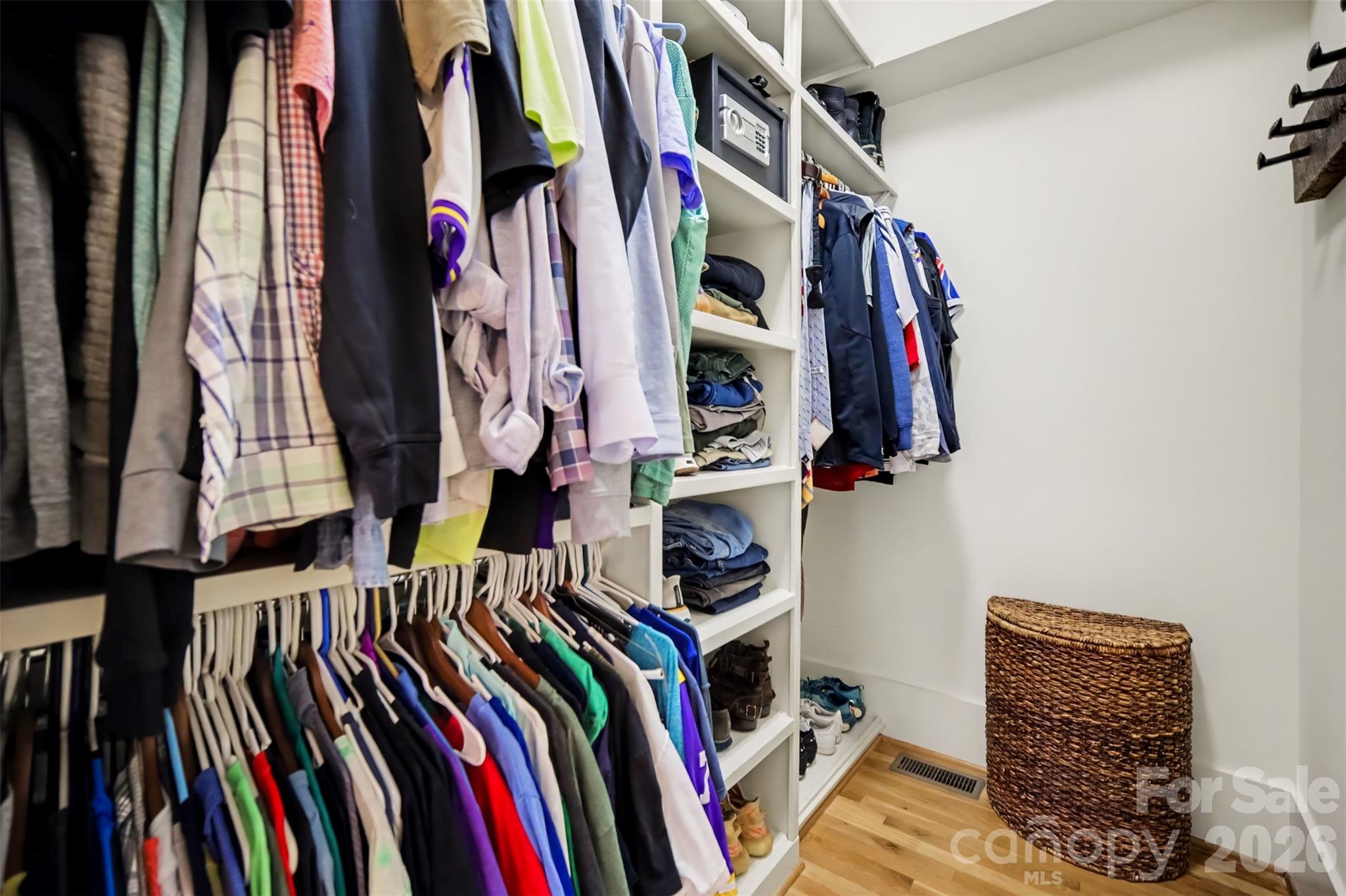 Two primary walk-in closets with custom built-ins - 206 June Bug Lane, Fort Mill