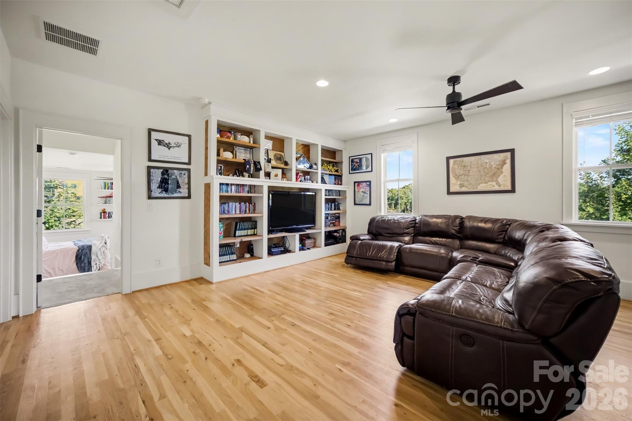 Upstairs loft with hardwood floors and built-ins - 206 June Bug Lane, Fort Mill
