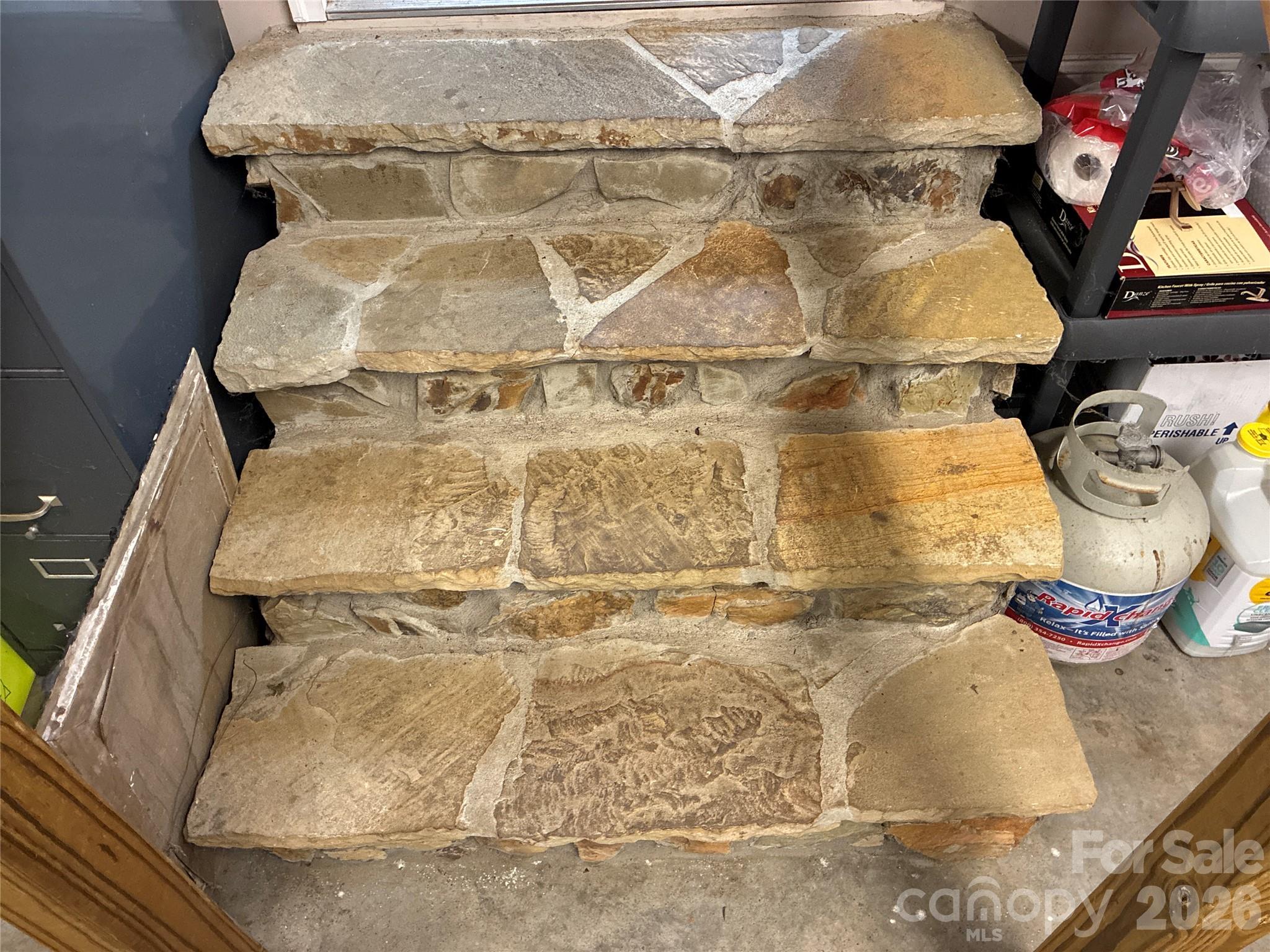 Nice details like the steps that lead from the garage to the home - 341 S Main Street, New London