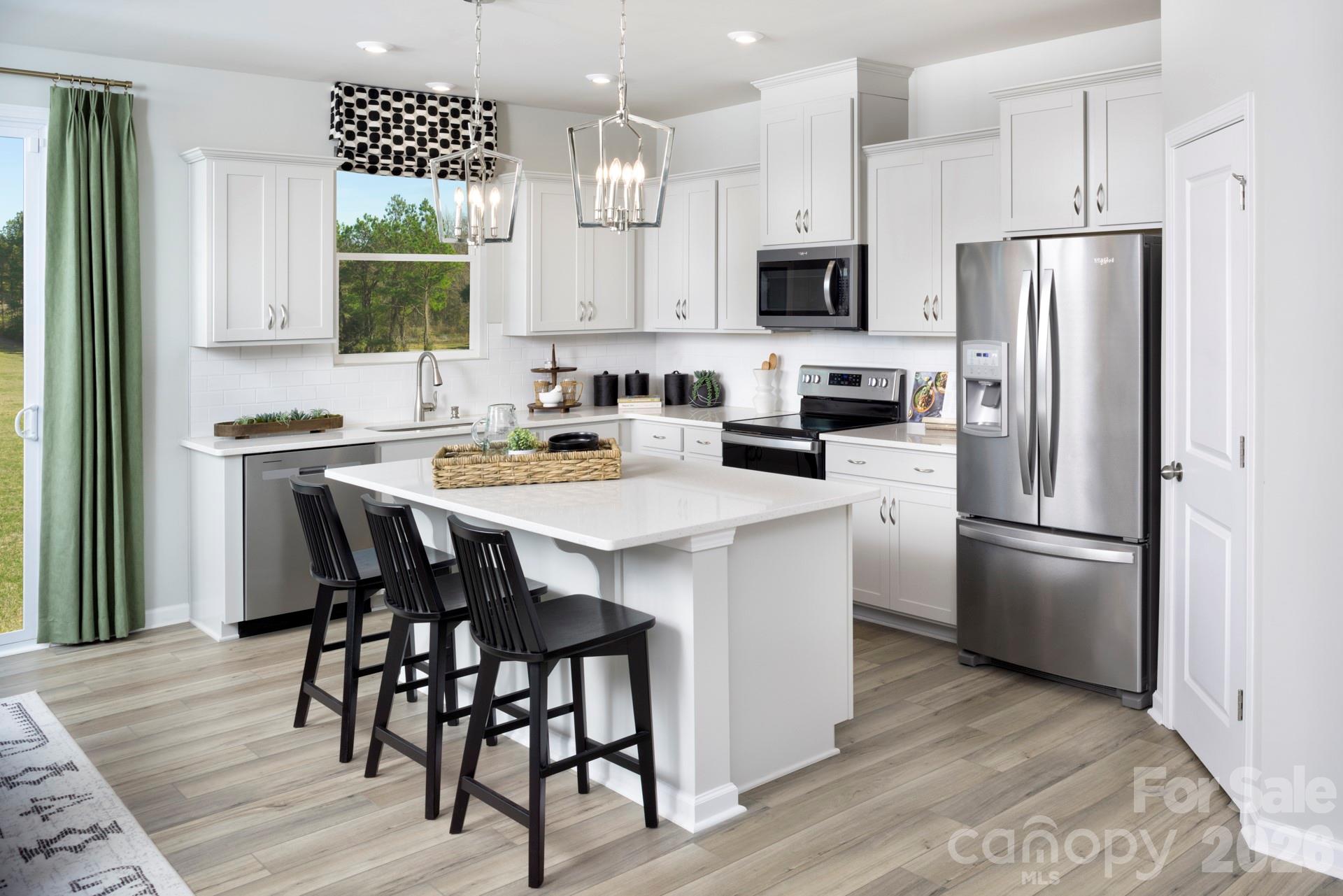 Photos shown are of a staged model home and are for illustrative purposes only. Floor plan is the same; however, finishes, colors, features, fixtures, furnishings, and design selections may vary from the actual home. - 6117 Mallow Crossing Lane, Charlotte