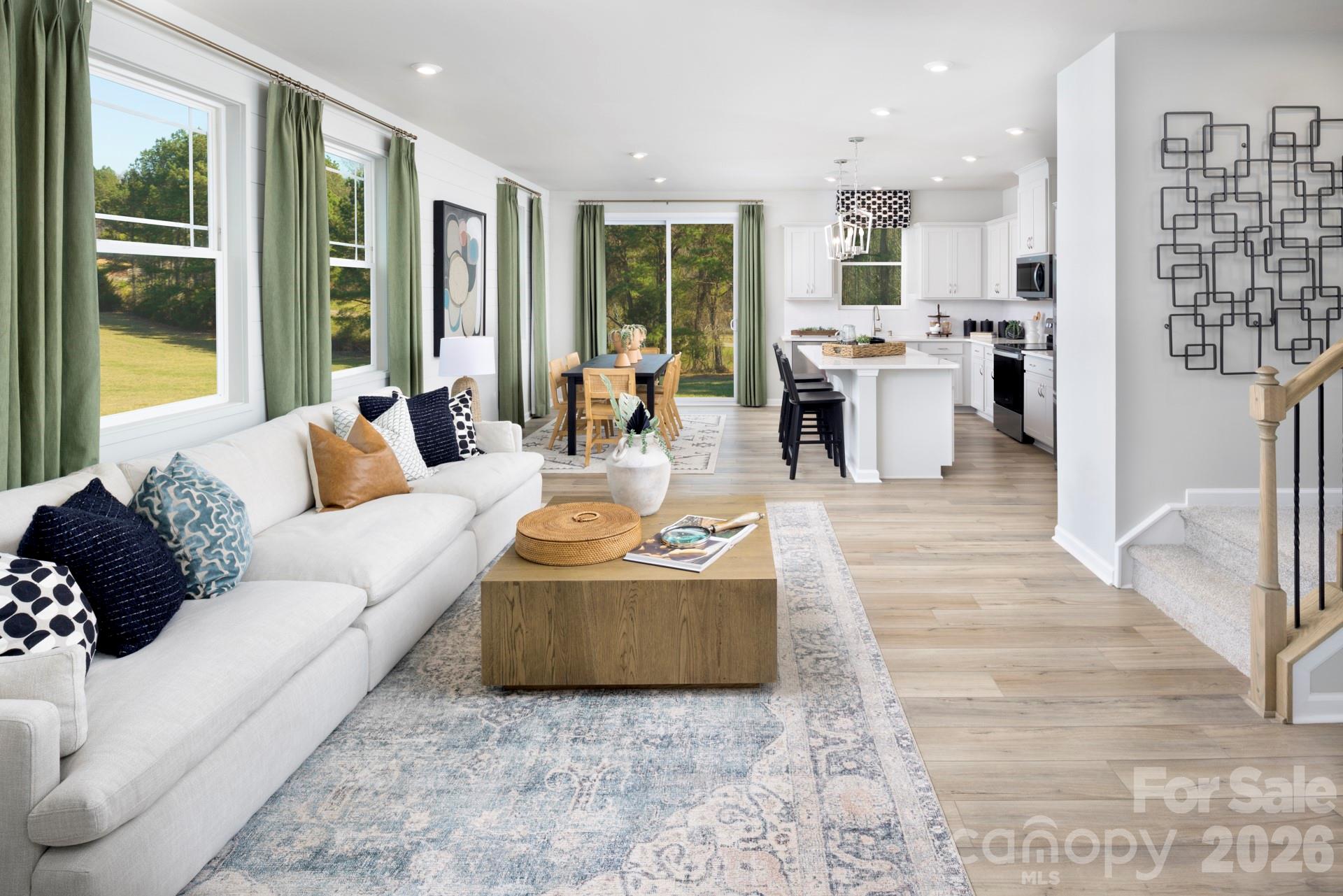 Photos shown are of a staged model home and are for illustrative purposes only. Floor plan is the same; however, finishes, colors, features, fixtures, furnishings, and design selections may vary from the actual home. - 6117 Mallow Crossing Lane, Charlotte