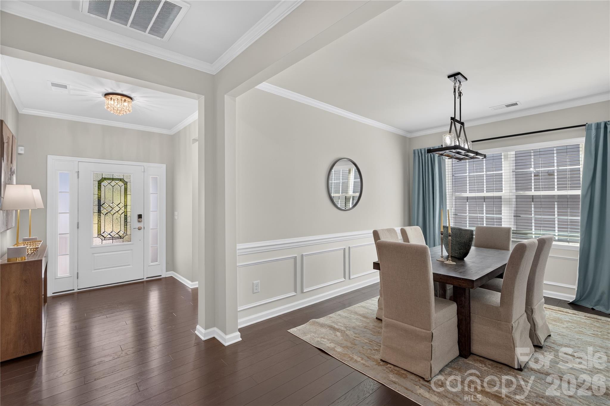 Welcoming foyer with dining area. - 16815 Lookout Landing Lane, Charlotte
