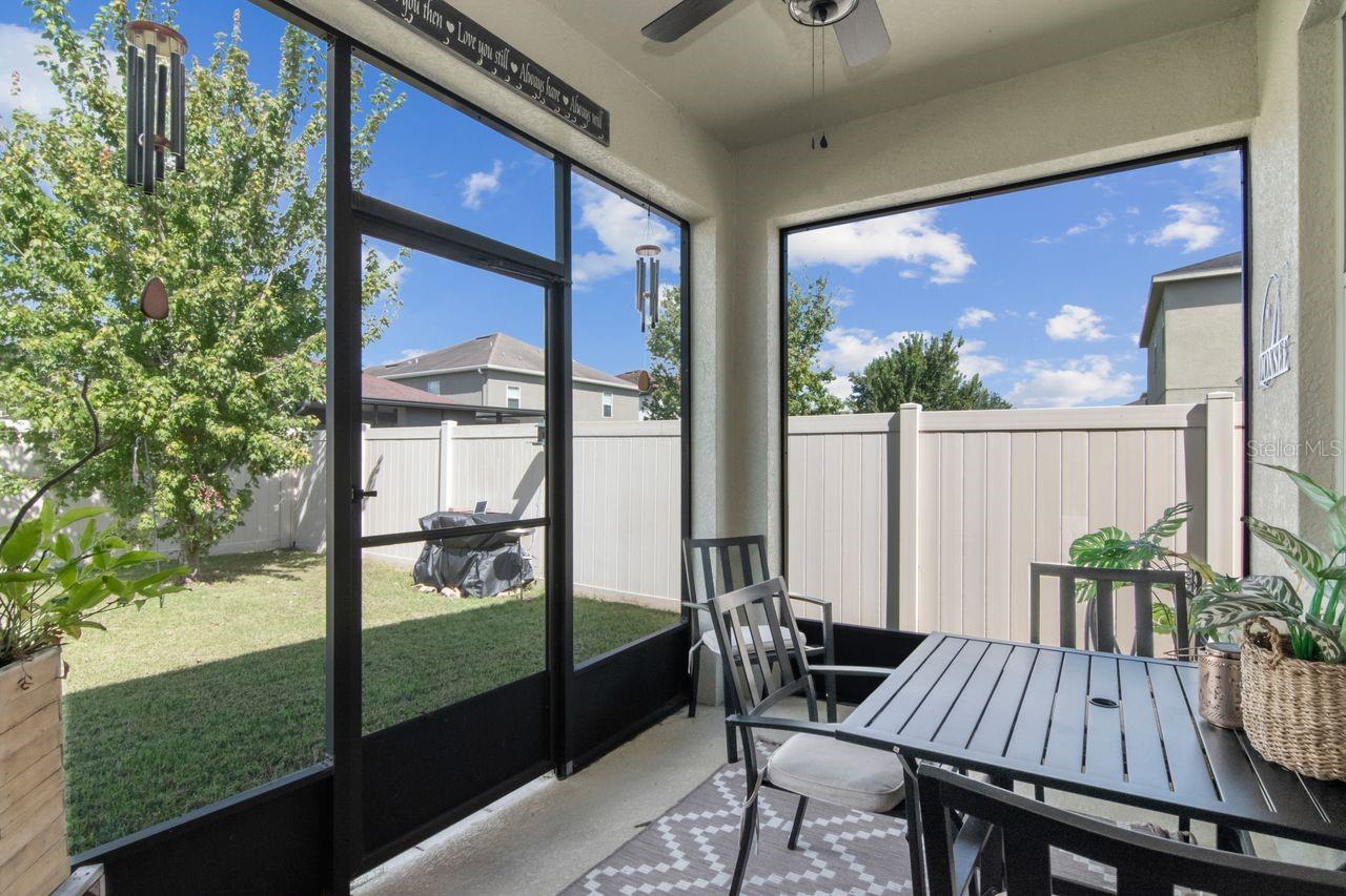 Enclosed patio with fan overhead. - 11143 SPRING POINT CIR, RIVERVIEW