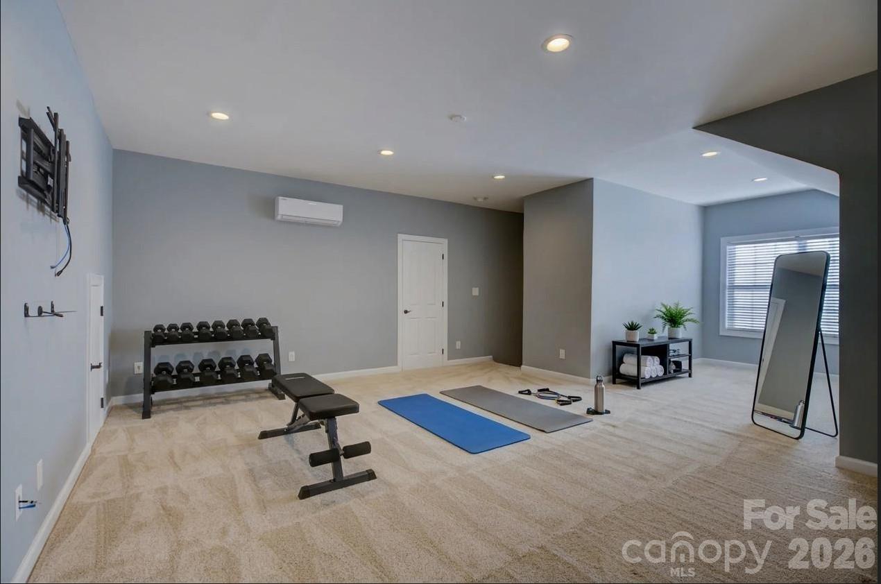 Virtually staged gym on the 3rd floor - 13700 Glen Abbey Drive, Charlotte